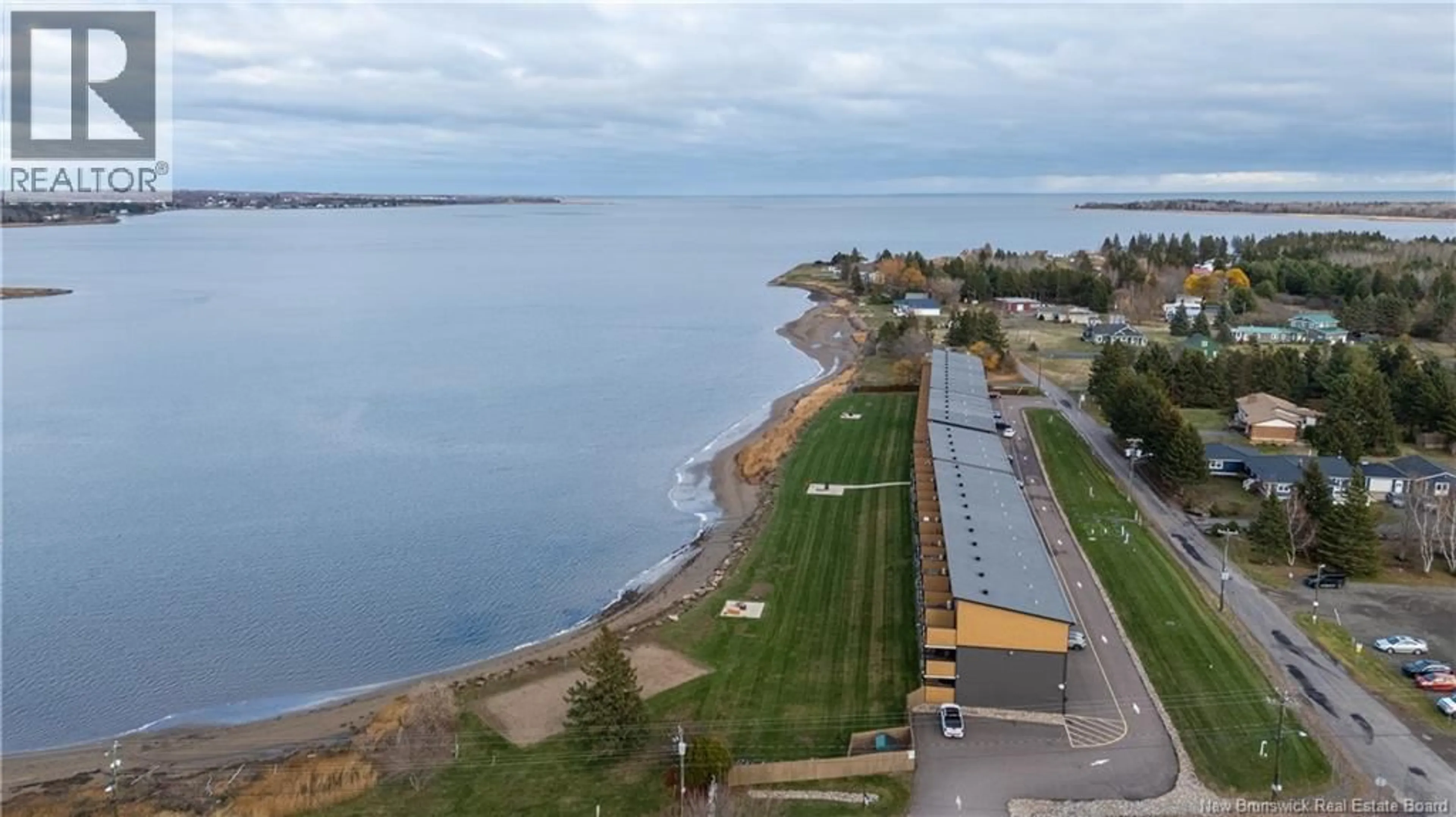 A pic from outside/outdoor area/front of a property/back of a property/a pic from drone, water/lake/river/ocean view for 132 - 3808 ROUTE 134, Shediac Bridge New Brunswick E4R1T5