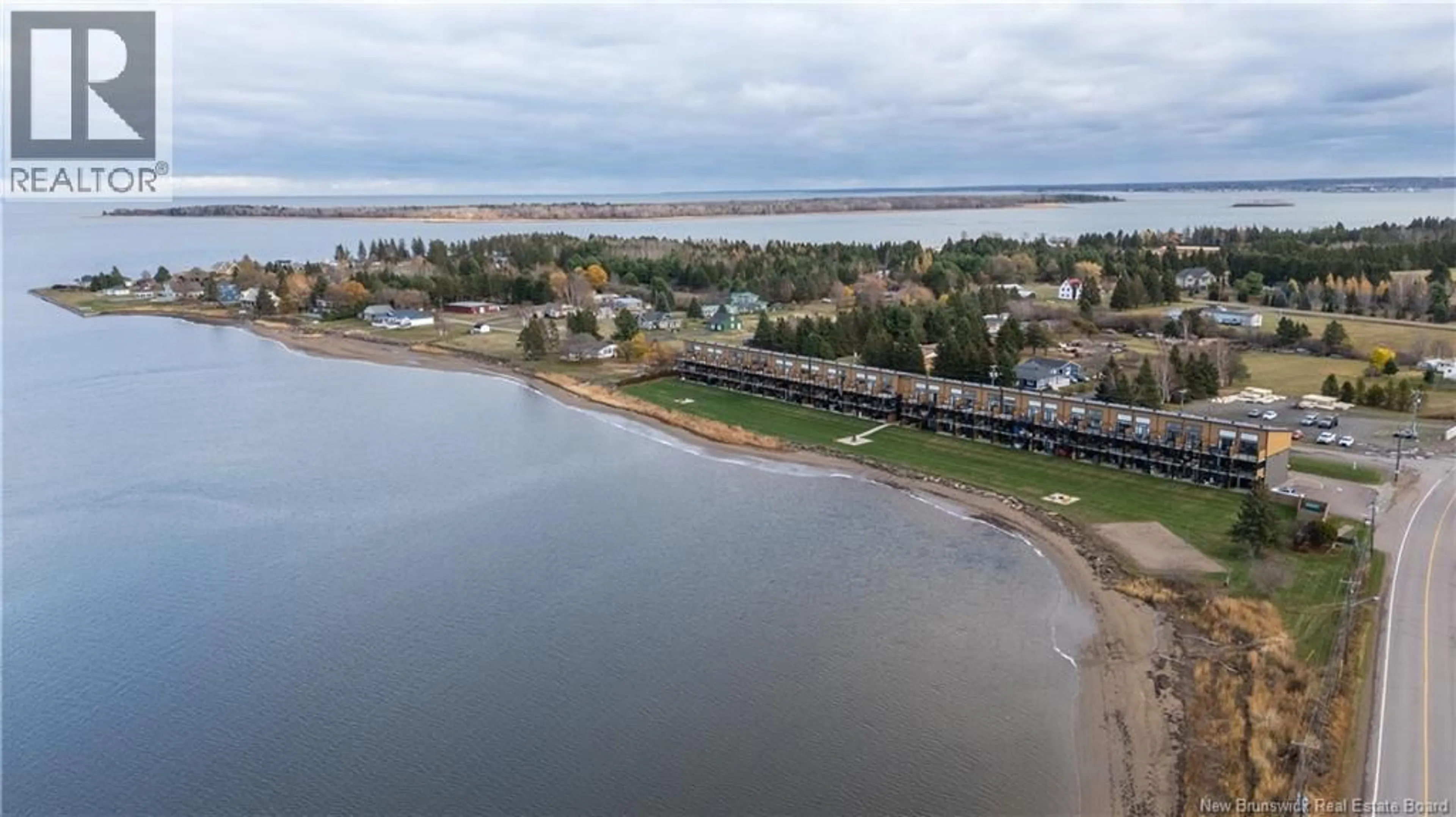 A pic from outside/outdoor area/front of a property/back of a property/a pic from drone, water/lake/river/ocean view for 132 - 3808 ROUTE 134, Shediac Bridge New Brunswick E4R1T5