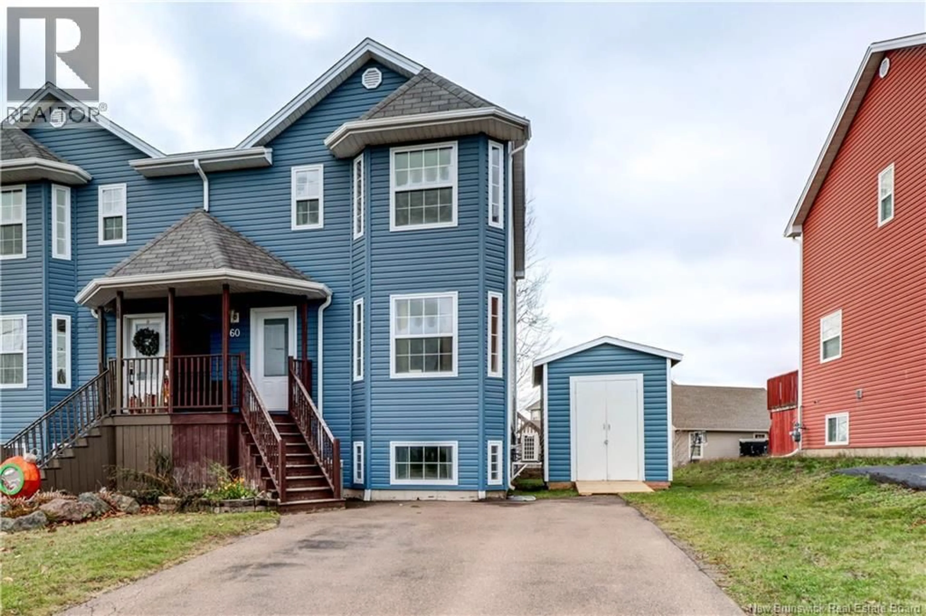 Home with vinyl exterior material, street for 60 HUNTERWOOD STREET, Moncton New Brunswick E1G0L2