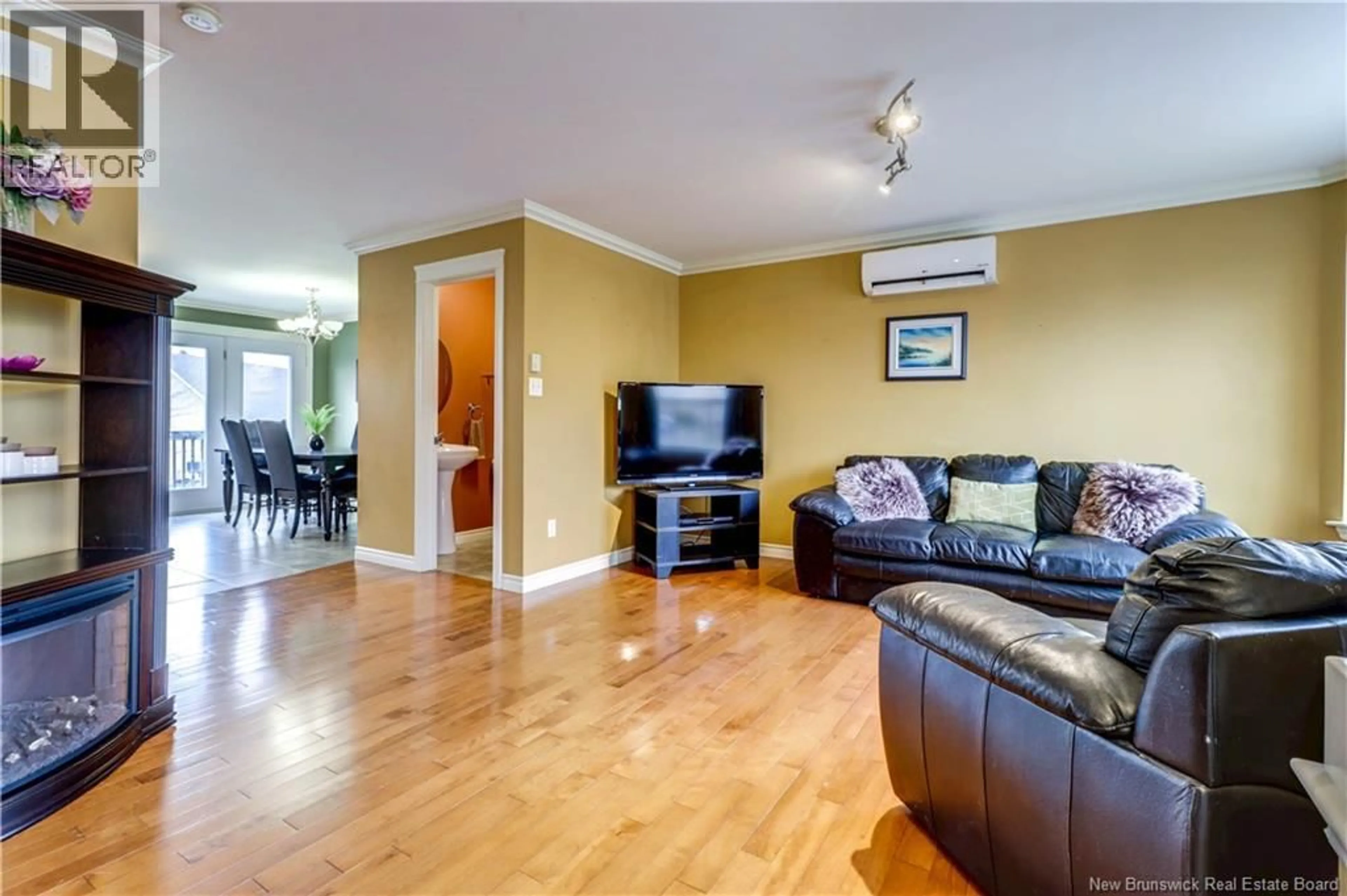 Living room with furniture, wood/laminate floor for 60 HUNTERWOOD STREET, Moncton New Brunswick E1G0L2