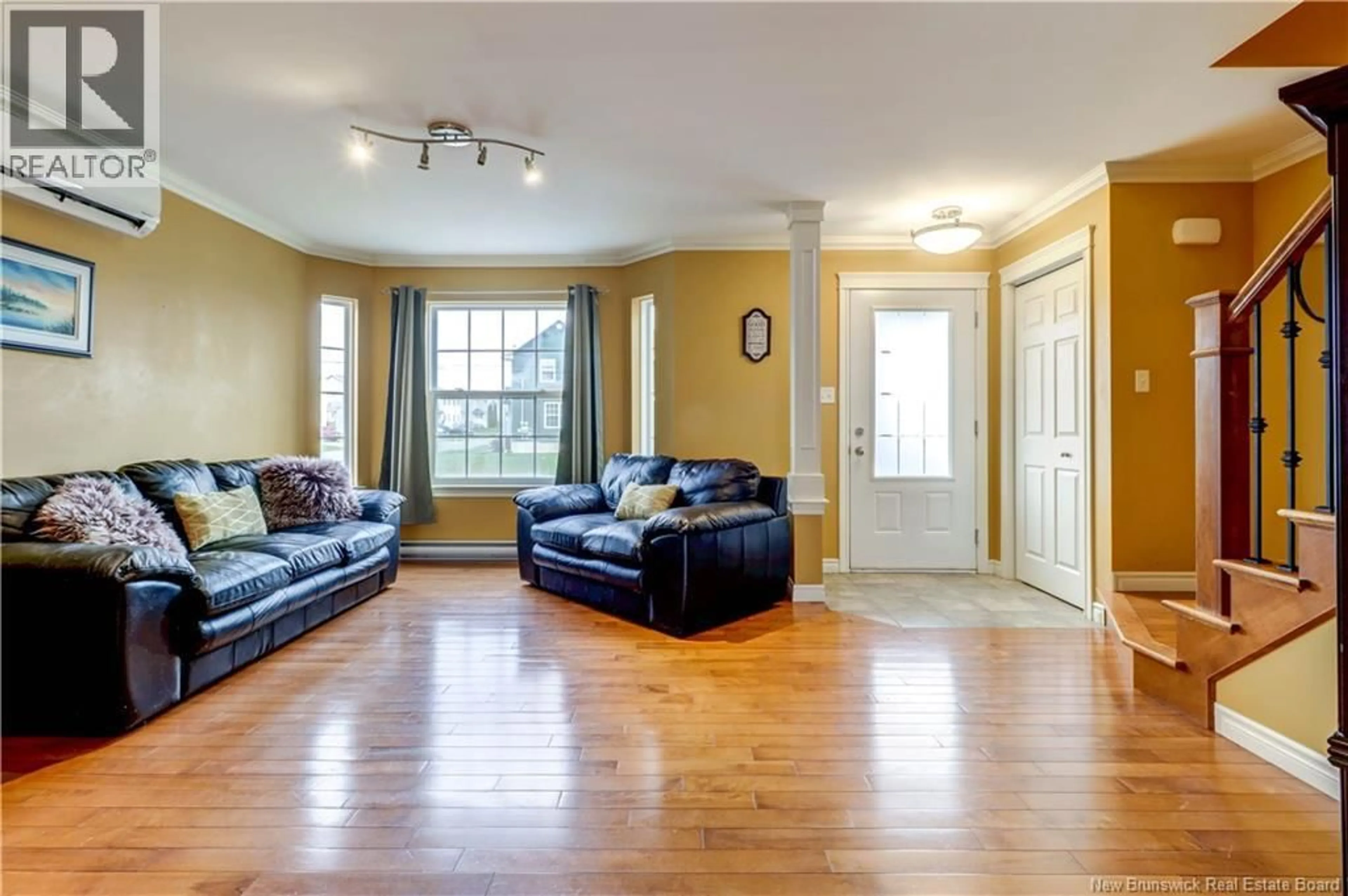 Living room with furniture, wood/laminate floor for 60 HUNTERWOOD STREET, Moncton New Brunswick E1G0L2