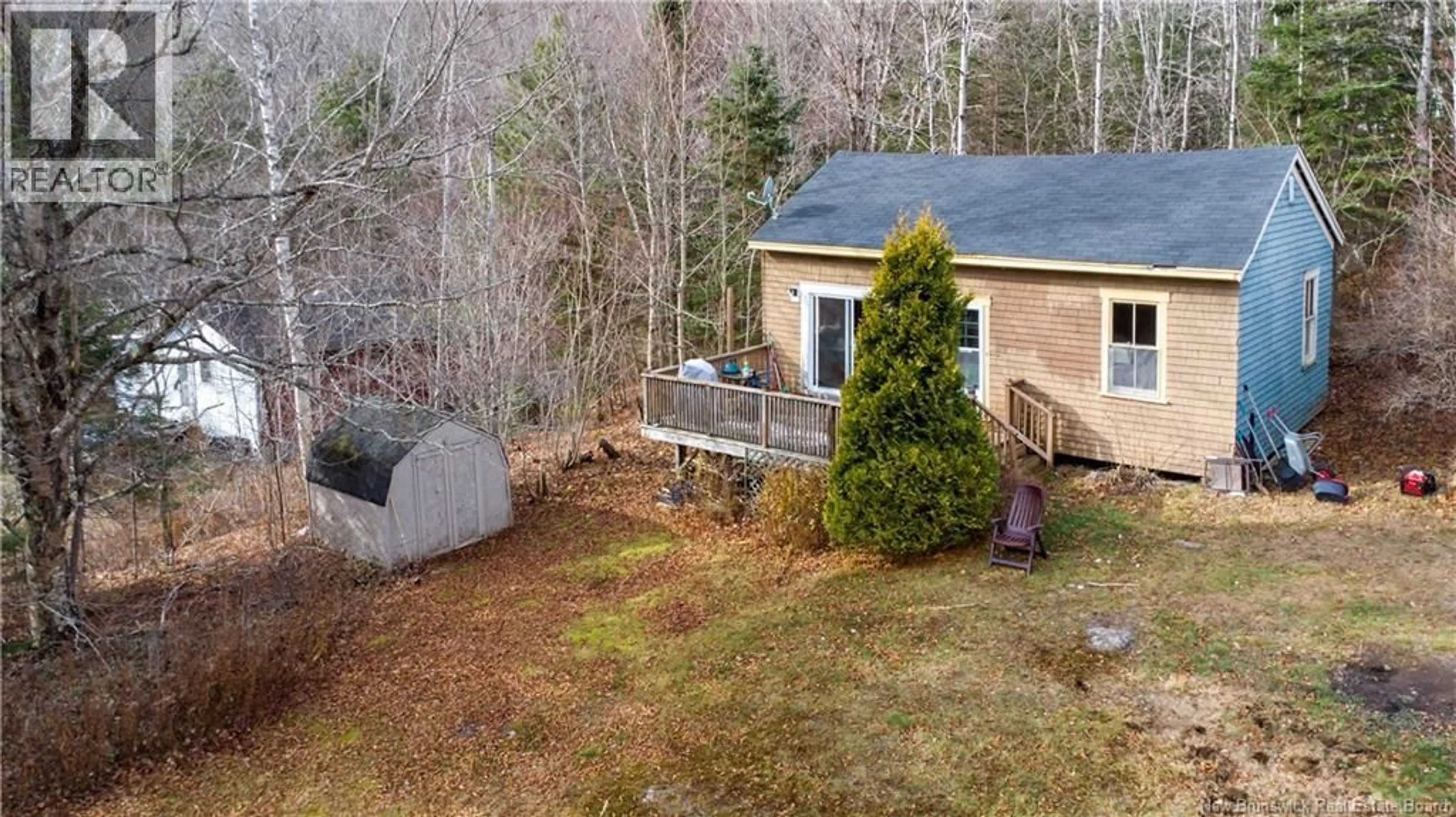 A pic from outside/outdoor area/front of a property/back of a property/a pic from drone, forest/trees view for 20 FOLEY LANE, Kingston New Brunswick E5S1B9