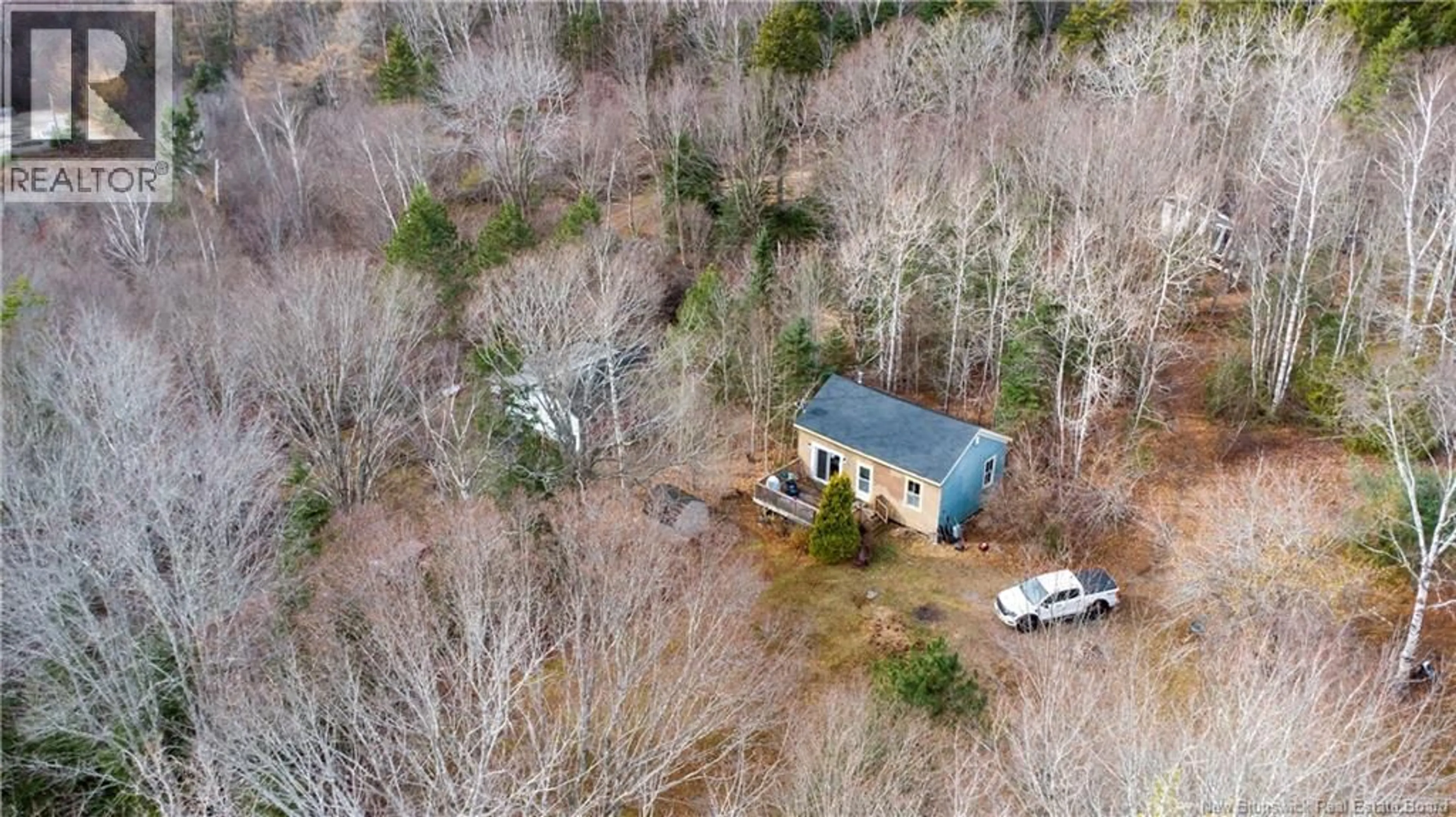 A pic from outside/outdoor area/front of a property/back of a property/a pic from drone, unknown for 20 FOLEY LANE, Kingston New Brunswick E5S1B9