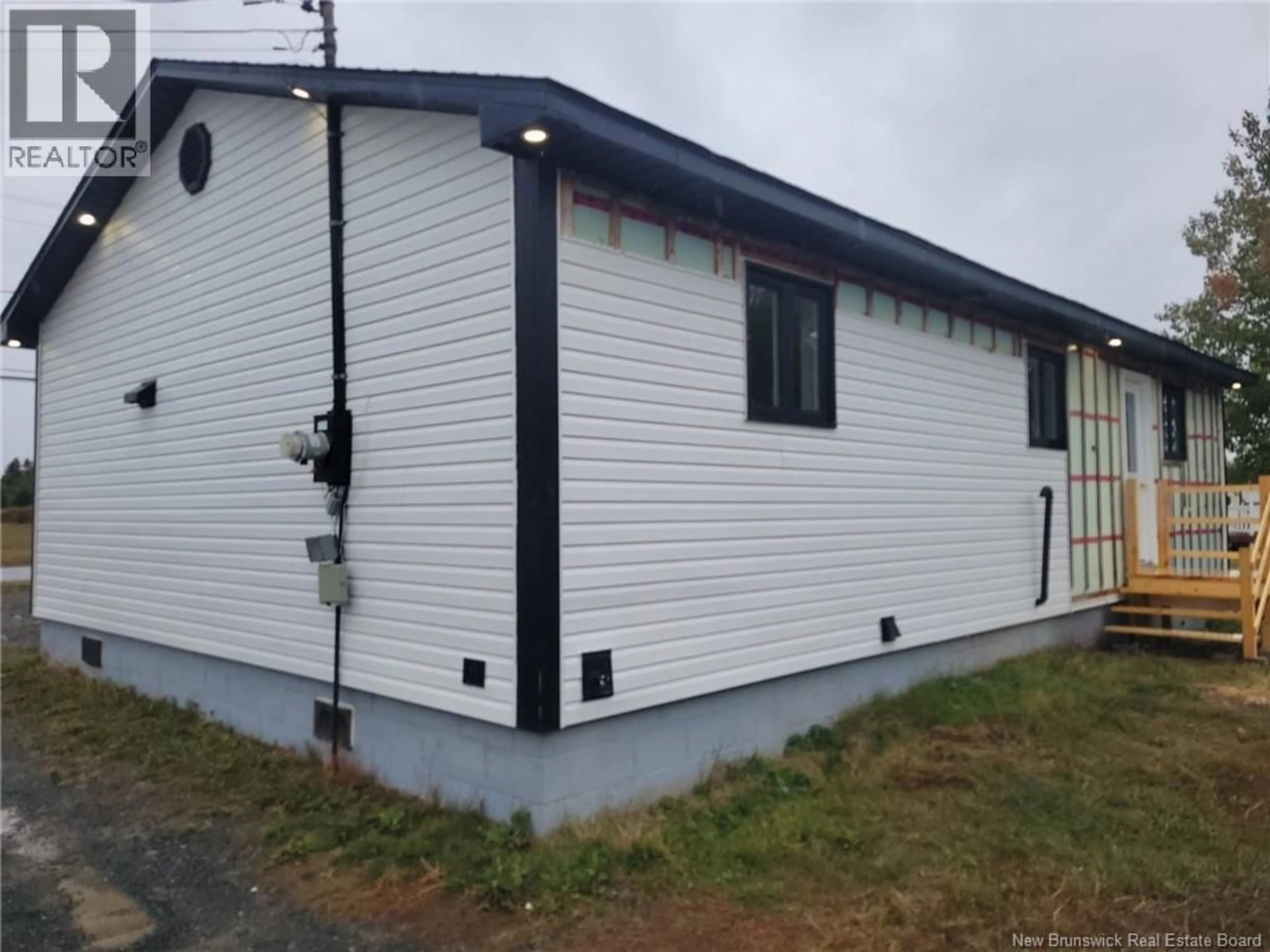 Home with vinyl exterior material, building for 1700 BOULEVARD DE LA MER, Sainte-Marie-Saint-Raphaël New Brunswick E8T1P4