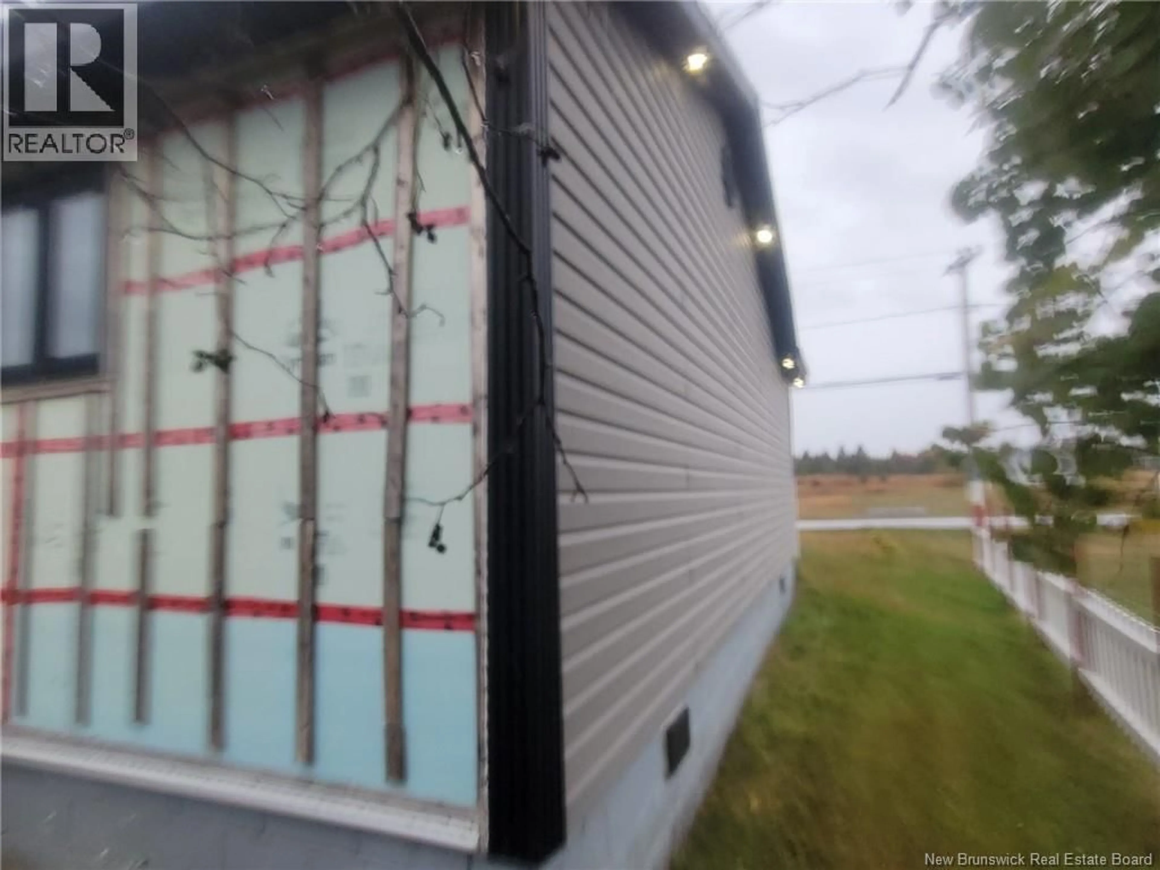 Home with vinyl exterior material, building for 1700 BOULEVARD DE LA MER, Sainte-Marie-Saint-Raphaël New Brunswick E8T1P4