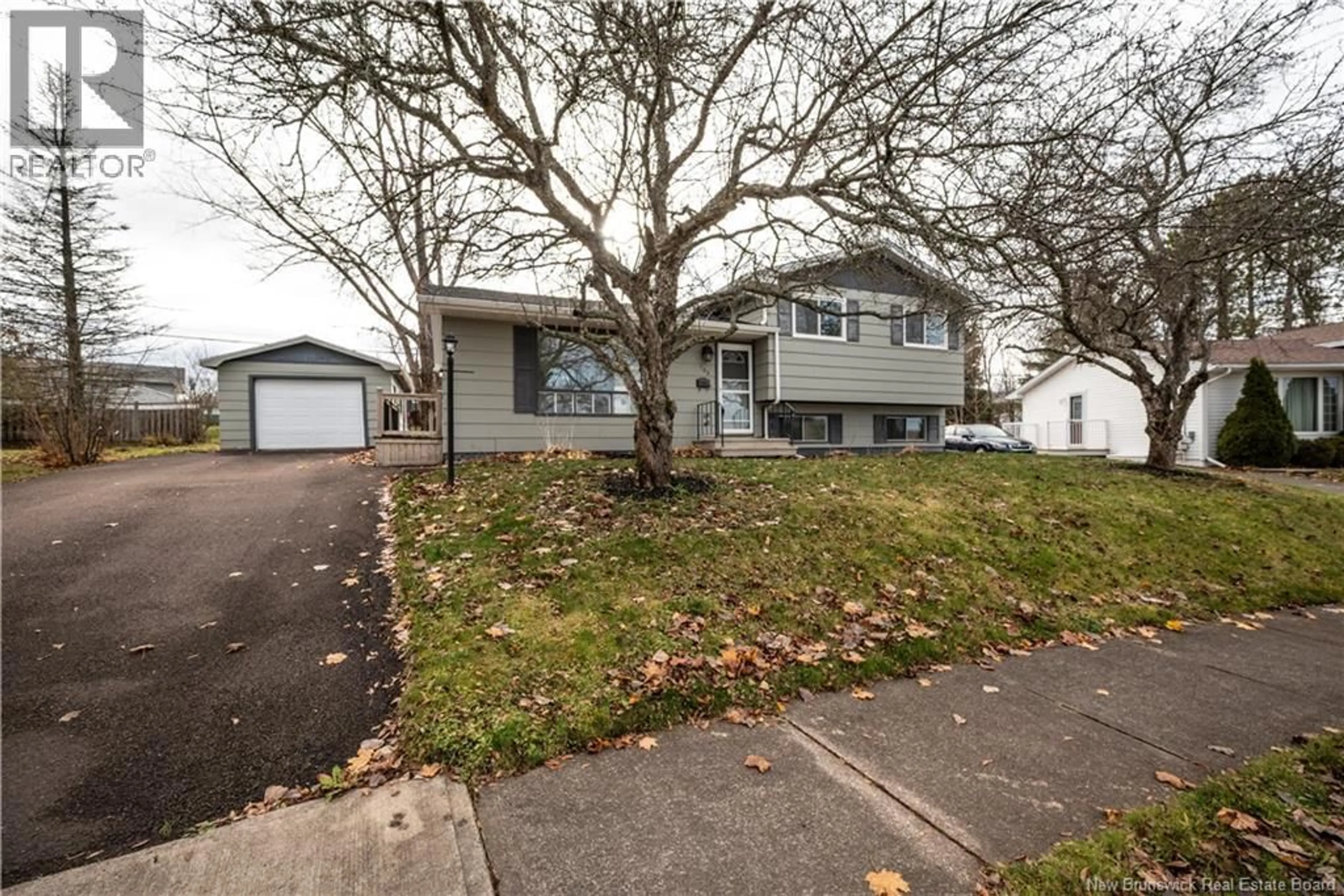 Home with vinyl exterior material, street for 102 NOTINGHAM DRIVE, Moncton New Brunswick E1A5K1