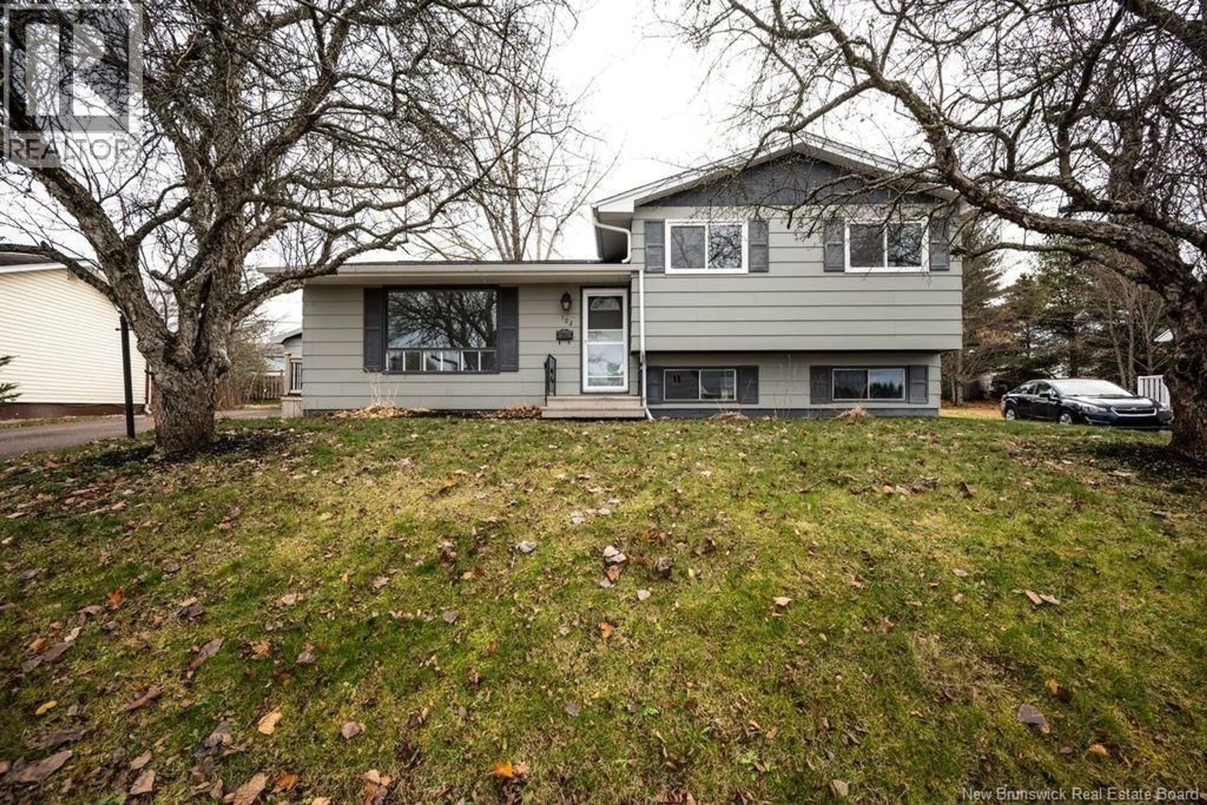 Home with vinyl exterior material, street for 102 NOTINGHAM DRIVE, Moncton New Brunswick E1A5K1