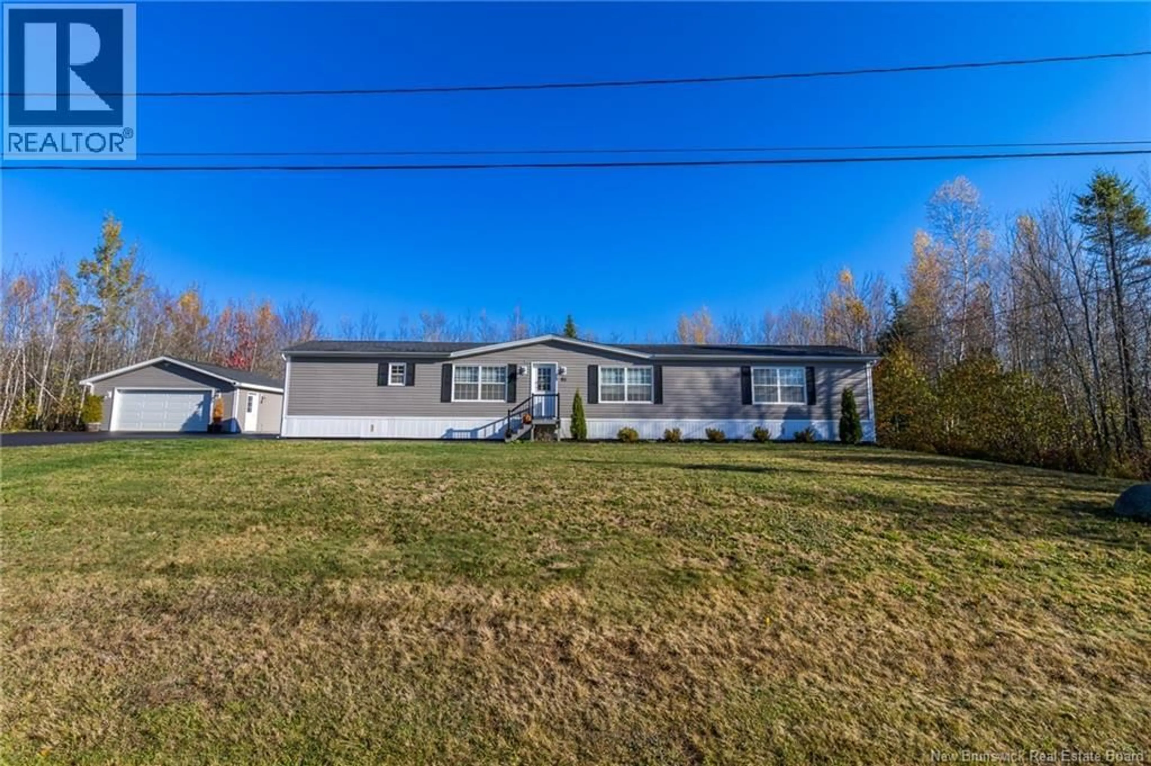 A pic from outside/outdoor area/front of a property/back of a property/a pic from drone, street for 95 CARRIE STREET, Rusagonis New Brunswick E3B0T2