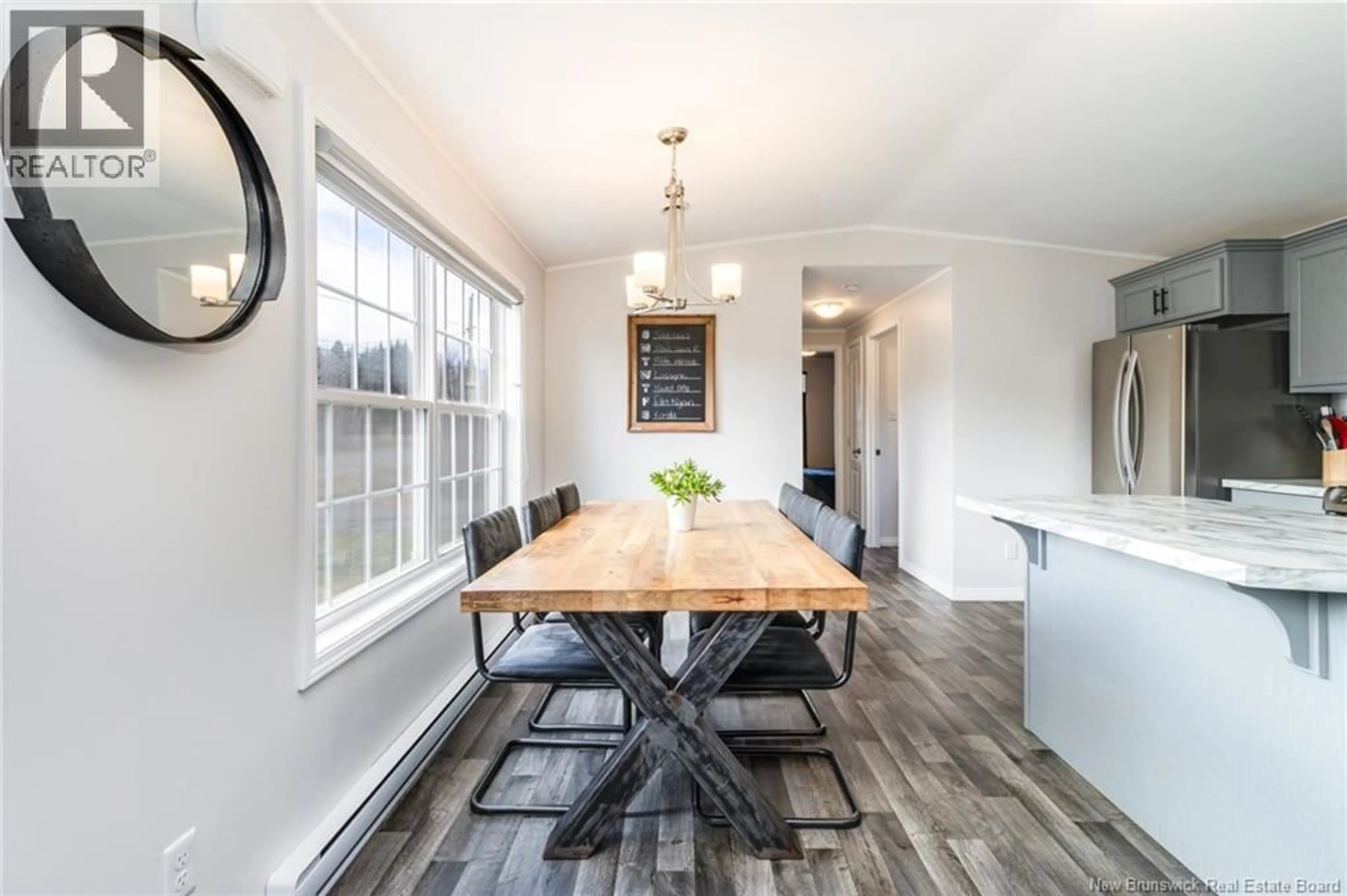 Dining room, wood/laminate floor for 95 CARRIE STREET, Rusagonis New Brunswick E3B0T2