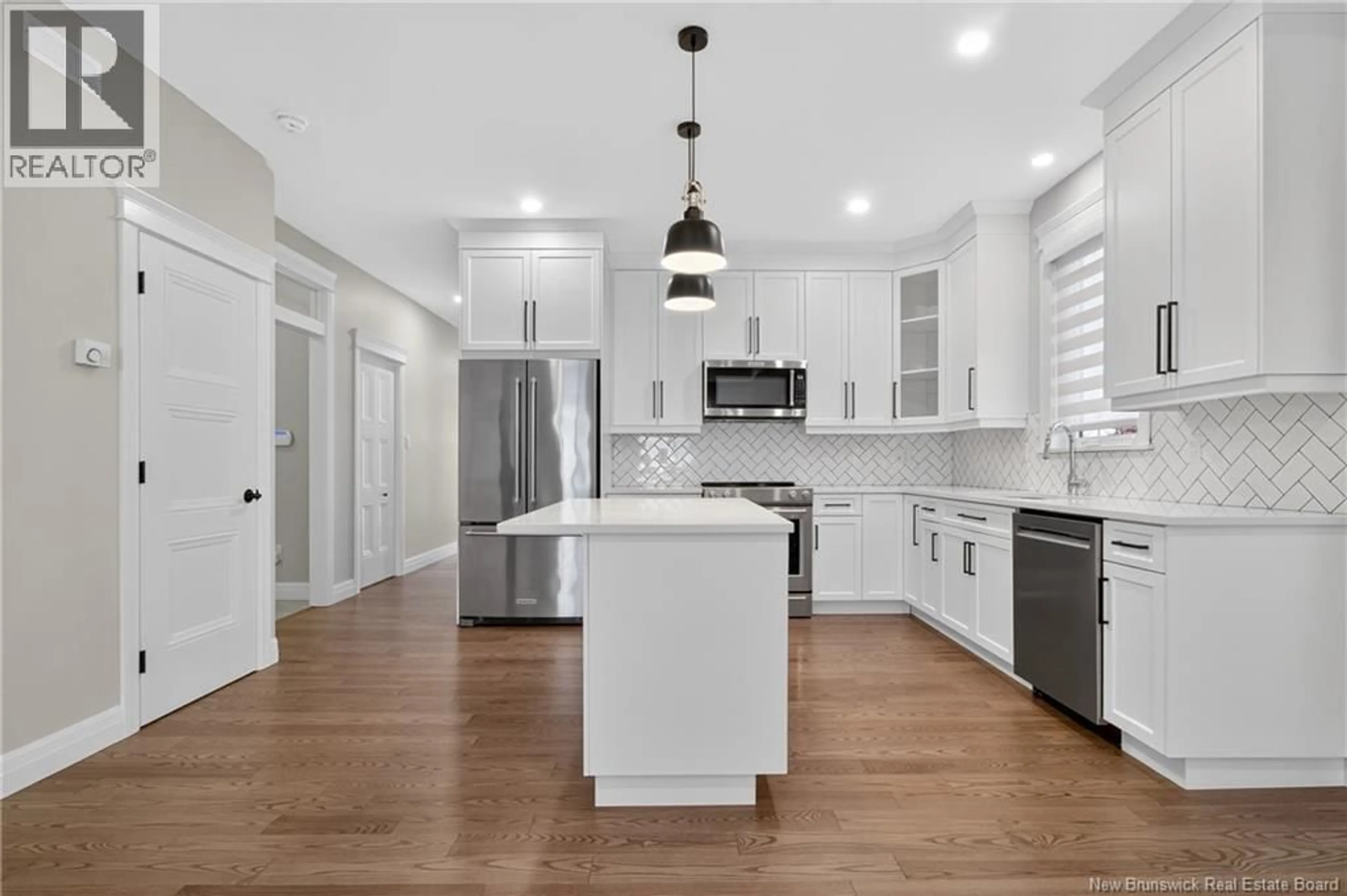 Open concept kitchen, ceramic/tile floor for 673 ROYAL OAKS BOULEVARD, Moncton New Brunswick E1H0G2