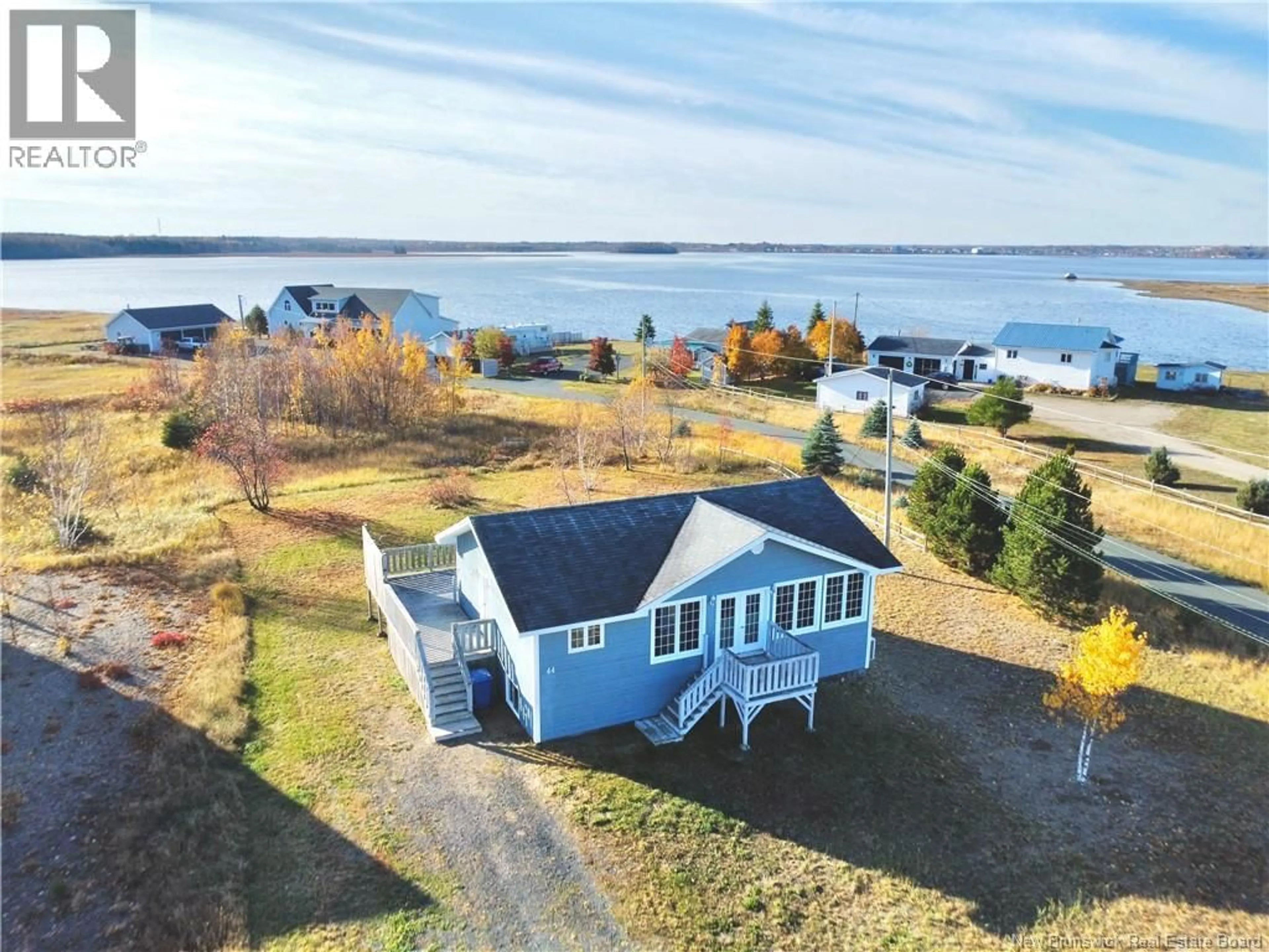 A pic from outside/outdoor area/front of a property/back of a property/a pic from drone, water/lake/river/ocean view for 44 BAYSHORE DRIVE, Bathurst New Brunswick E2A6A4