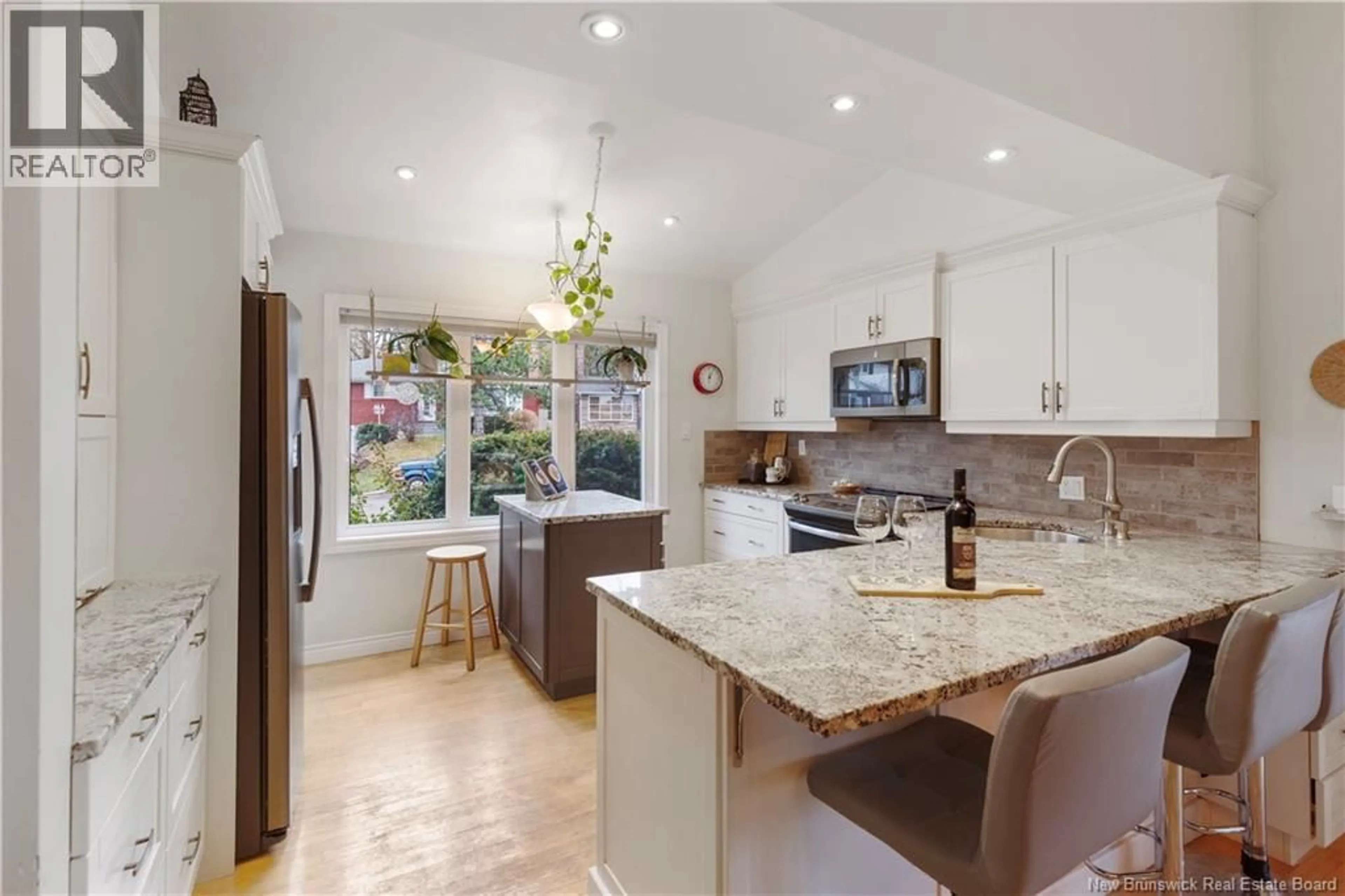 Open concept kitchen, ceramic/tile floor for 27 MONTCLAIR AVENUE, Moncton New Brunswick E1E1T7