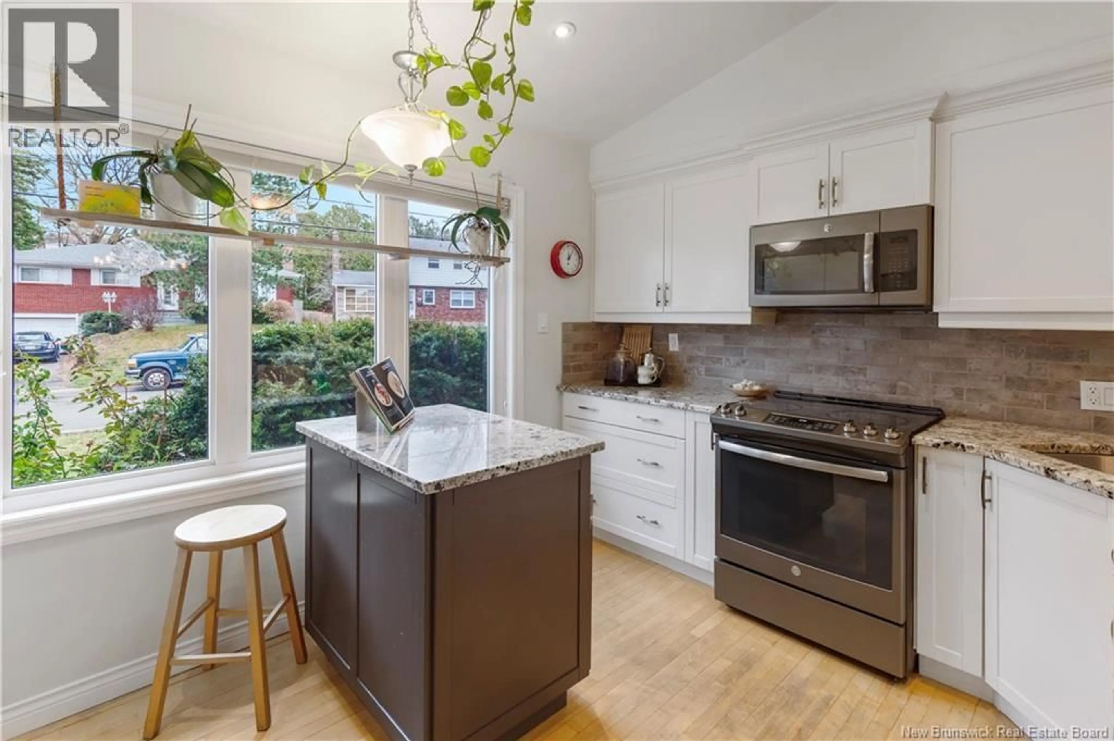 Open concept kitchen, ceramic/tile floor for 27 MONTCLAIR AVENUE, Moncton New Brunswick E1E1T7