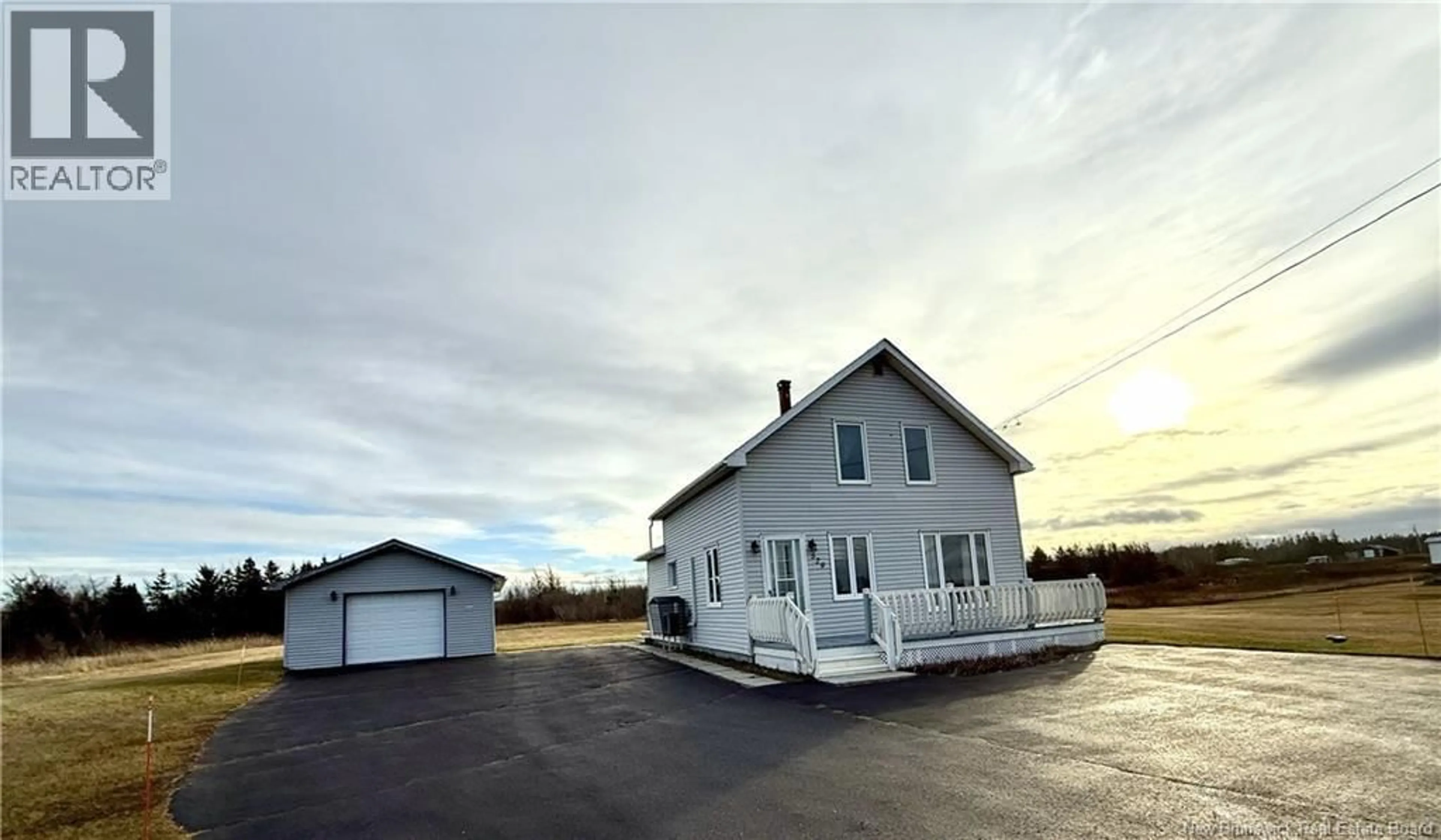 A pic from outside/outdoor area/front of a property/back of a property/a pic from drone, building for 529 RUE ACADIE, Grande-Anse New Brunswick E8N1E7
