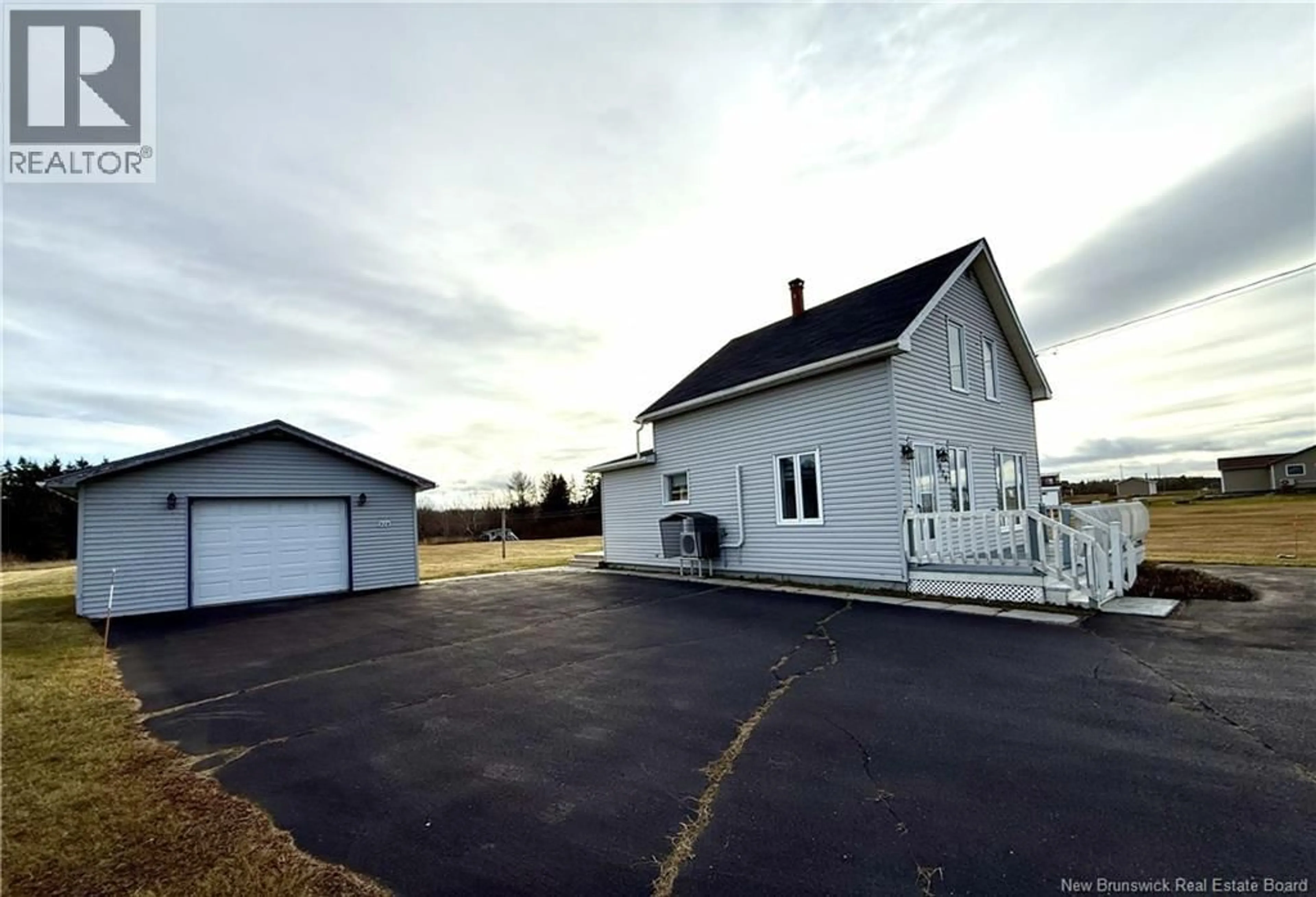 A pic from outside/outdoor area/front of a property/back of a property/a pic from drone, building for 529 RUE ACADIE, Grande-Anse New Brunswick E8N1E7