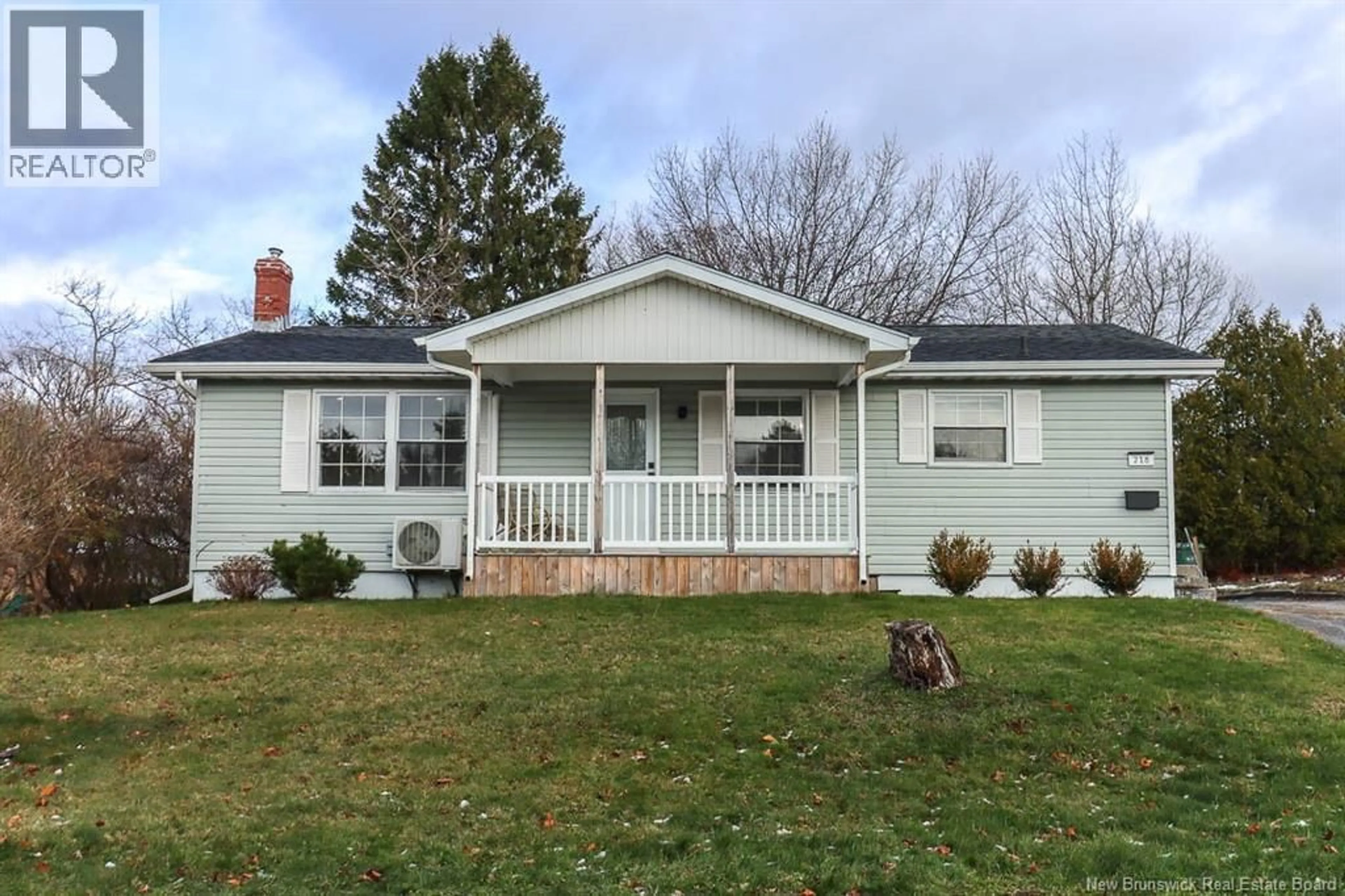 Home with vinyl exterior material, street for 218 MCNAMARA DRIVE, Saint John New Brunswick E2J3L4