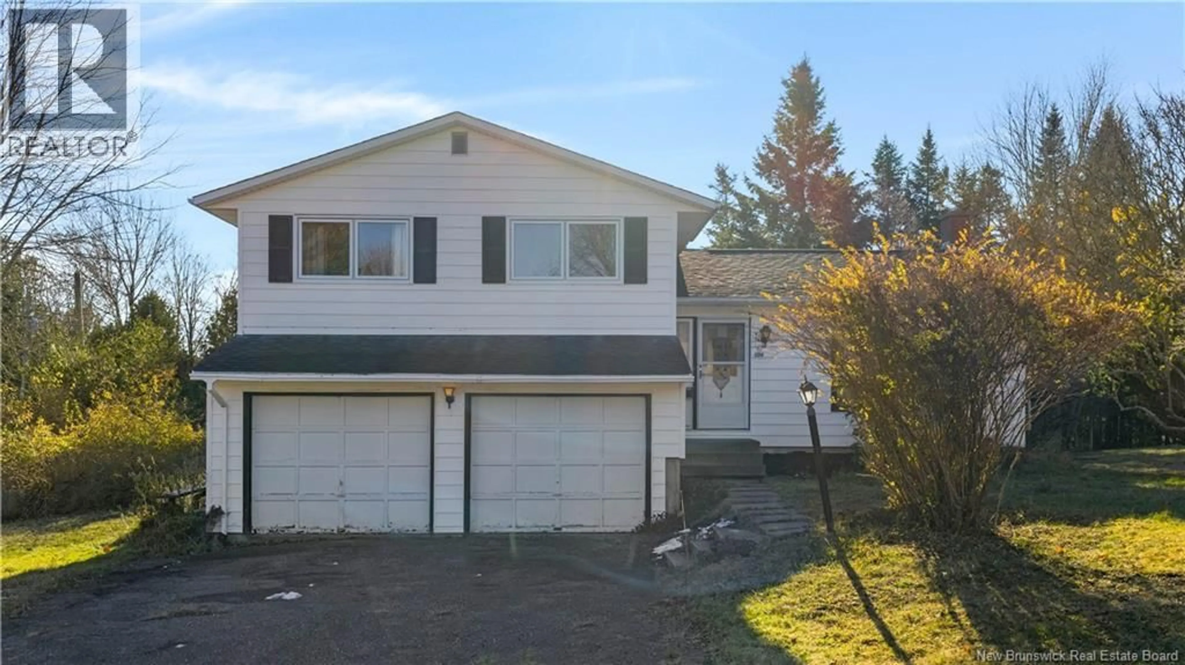 Home with vinyl exterior material, street for 104 LANCELOT DRIVE, Quispamsis New Brunswick E2E1R8