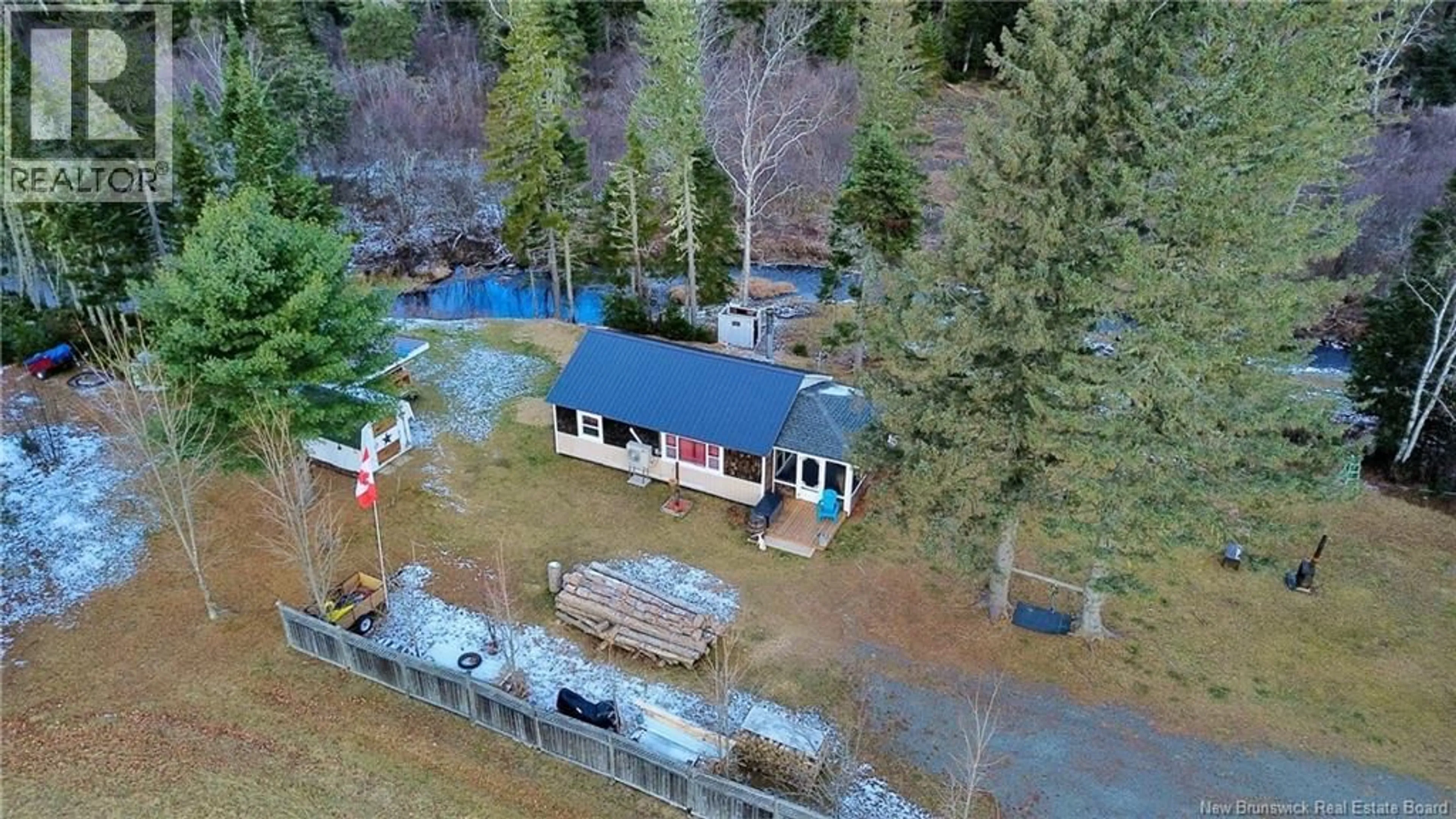 A pic from outside/outdoor area/front of a property/back of a property/a pic from drone, unknown for 15 NORTH RIDGE ROAD, Foreston New Brunswick E7L1K4