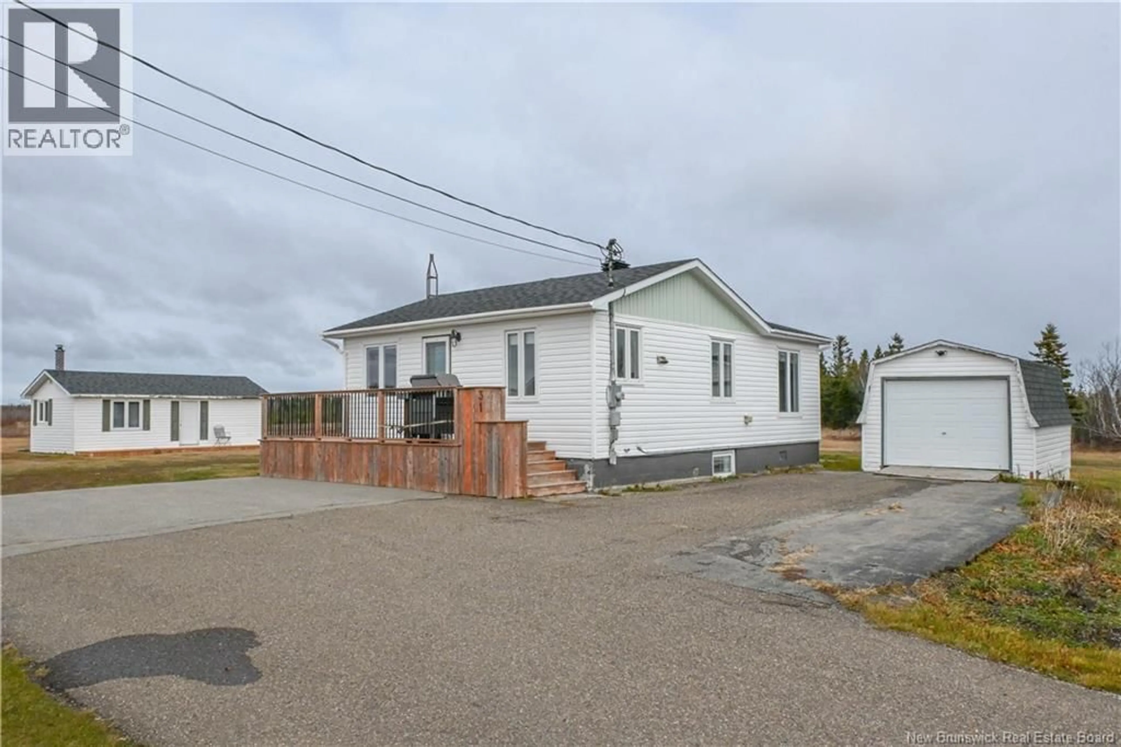 A pic from outside/outdoor area/front of a property/back of a property/a pic from drone, street for 31 RUE DU HAMEAU STREET, Saint-Marie-Saint-Raphaël New Brunswick E8T1R4