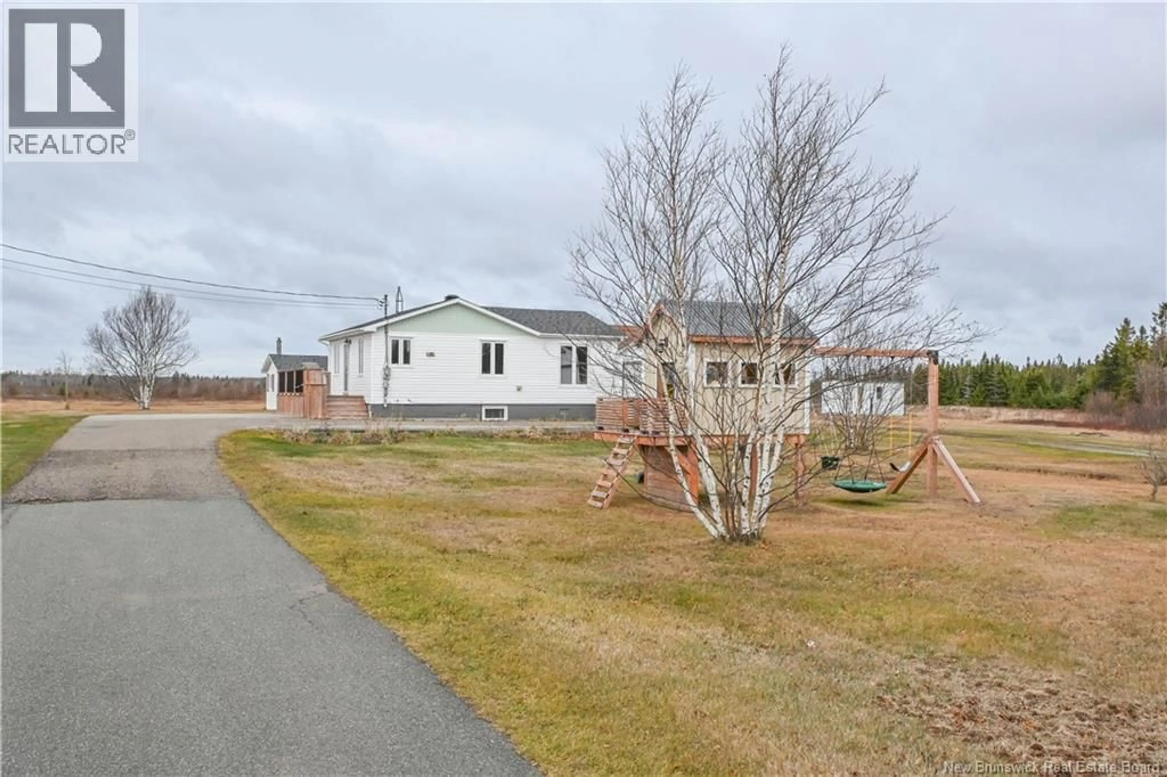 A pic from outside/outdoor area/front of a property/back of a property/a pic from drone, street for 31 RUE DU HAMEAU STREET, Saint-Marie-Saint-Raphaël New Brunswick E8T1R4