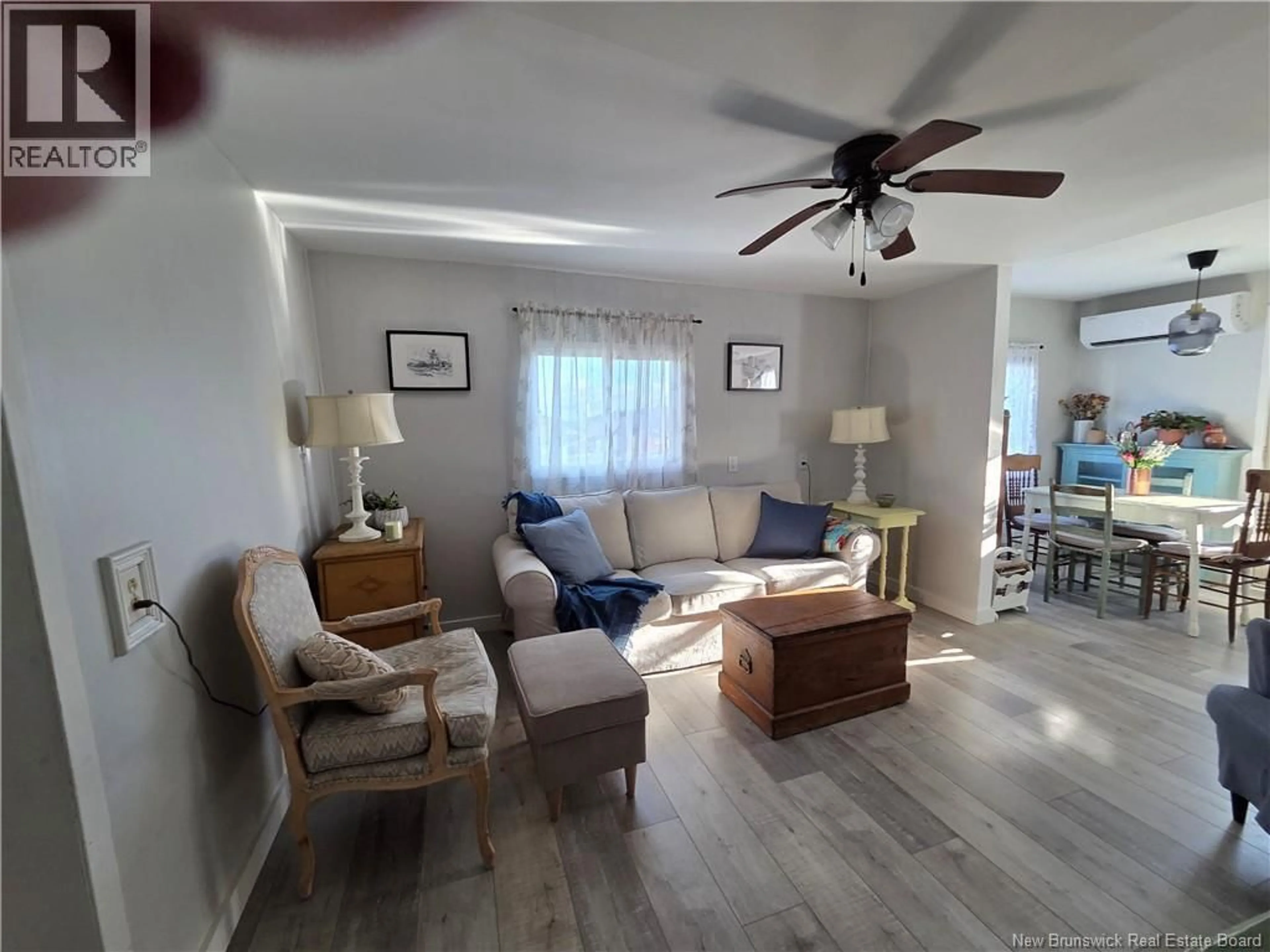 Living room with furniture, wood/laminate floor for 87 FRENCH VILLAGE ROAD, Blacks Harbour New Brunswick E5H1G1