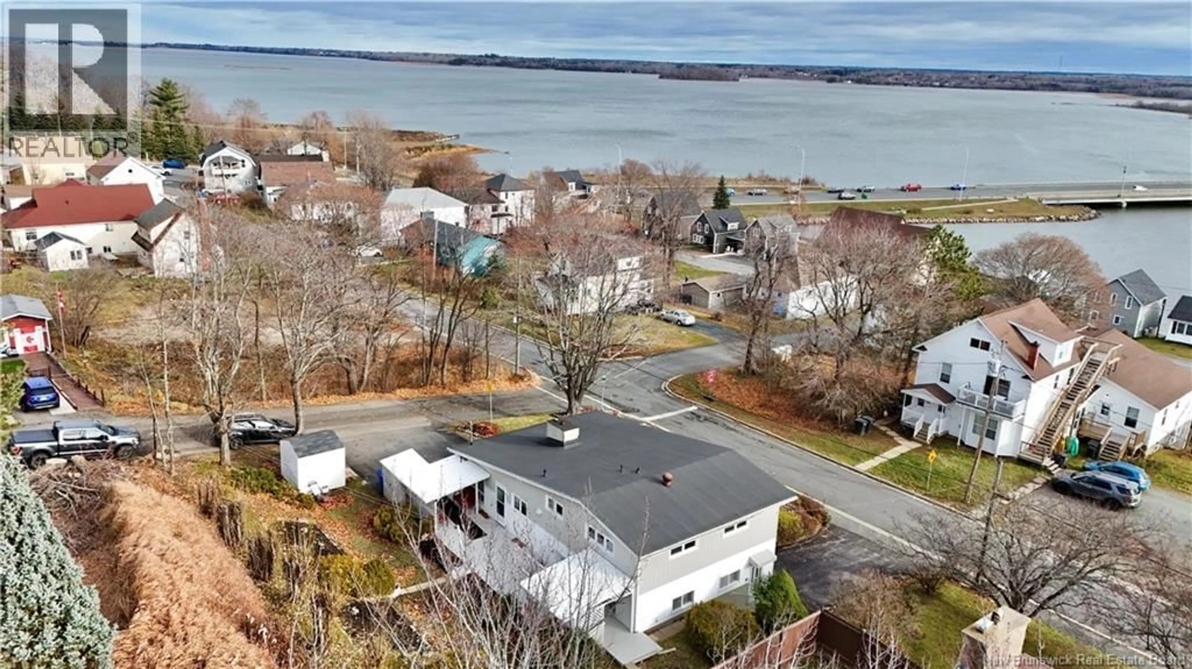 A pic from outside/outdoor area/front of a property/back of a property/a pic from drone, water/lake/river/ocean view for 408 PRINCESS, Bathurst New Brunswick E2A2R8