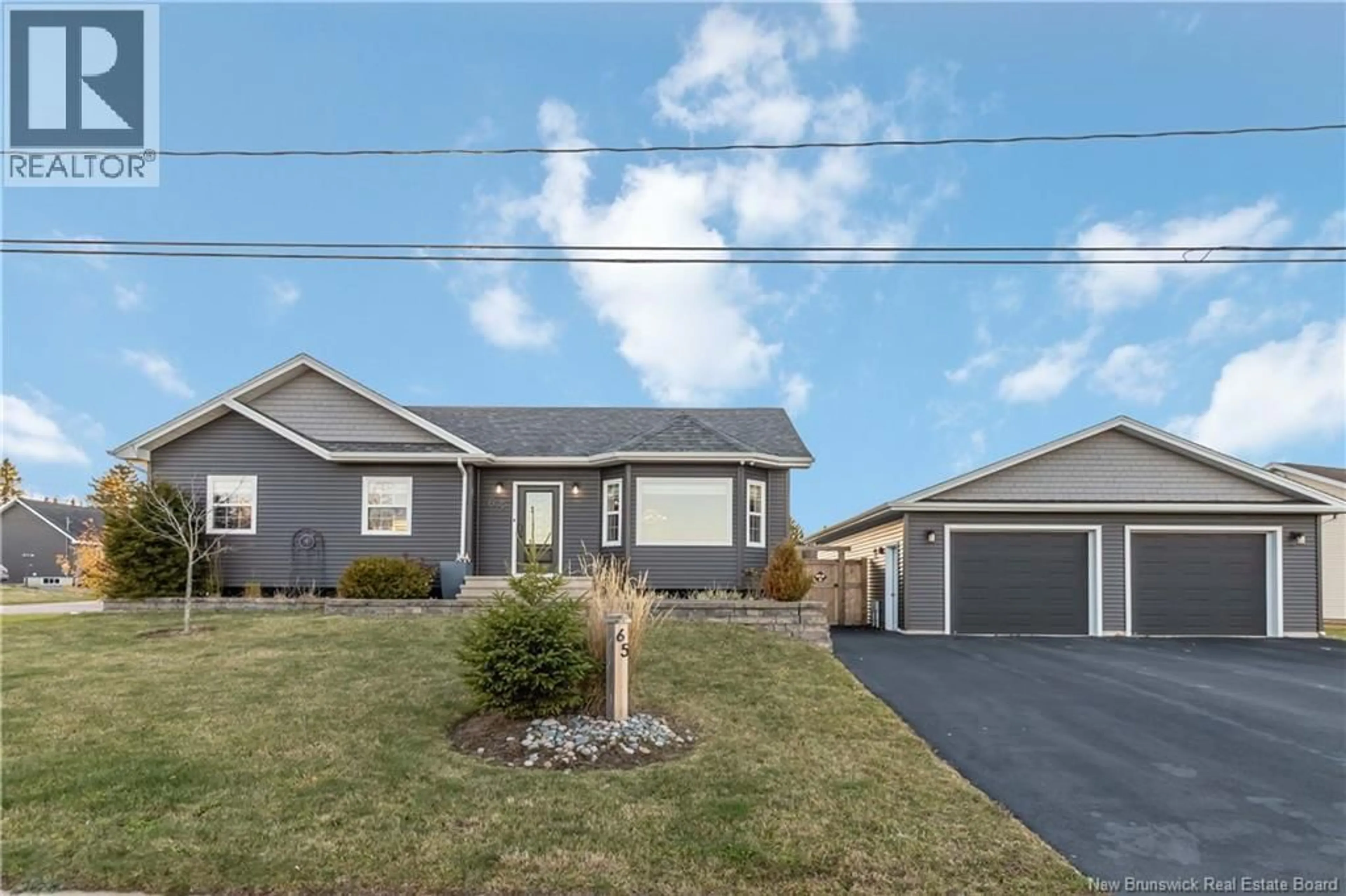 Home with vinyl exterior material, street for 65 RAPHAEL STREET, Dieppe New Brunswick E1A8S3