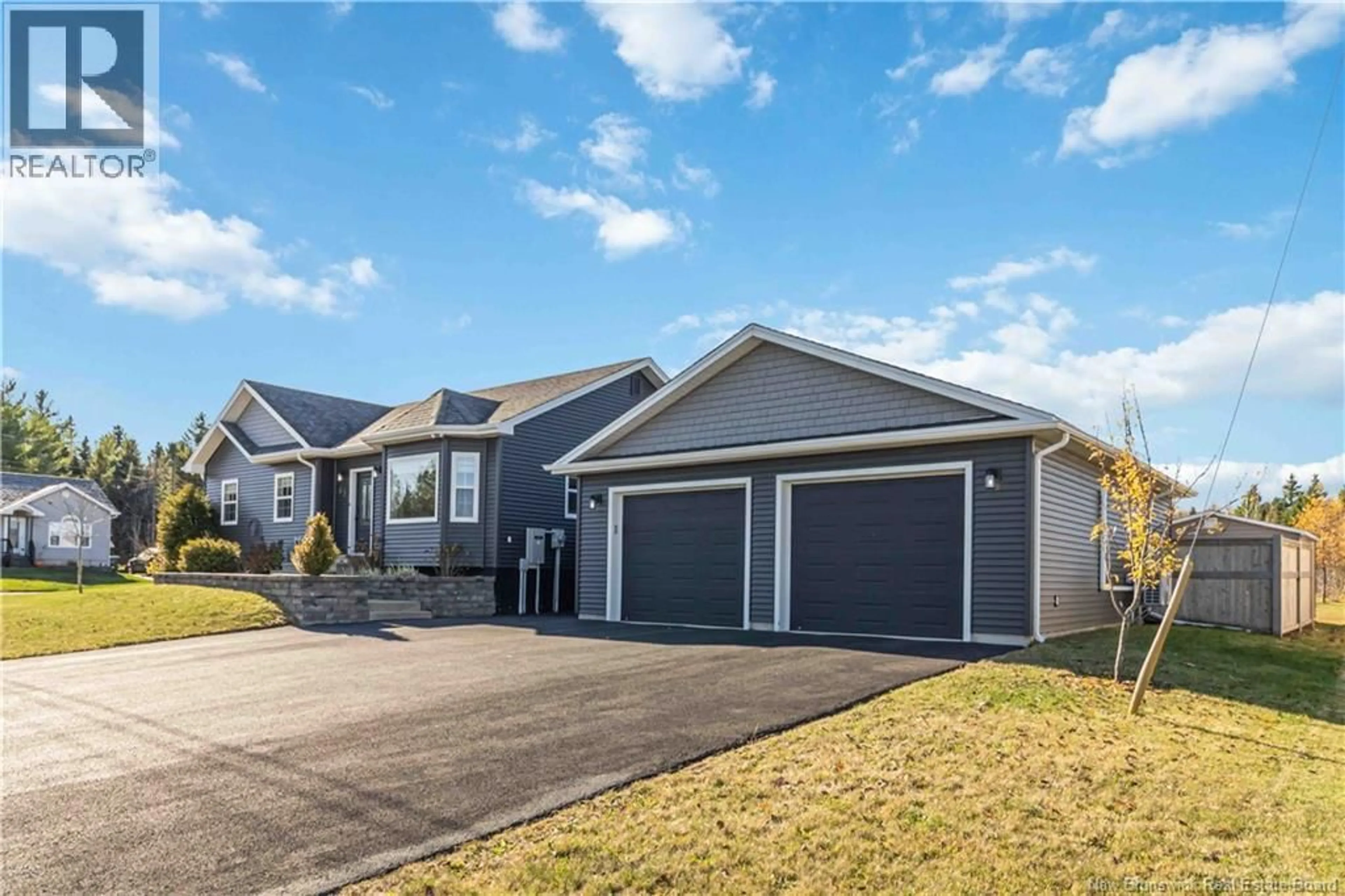 Home with vinyl exterior material, street for 65 RAPHAEL STREET, Dieppe New Brunswick E1A8S3