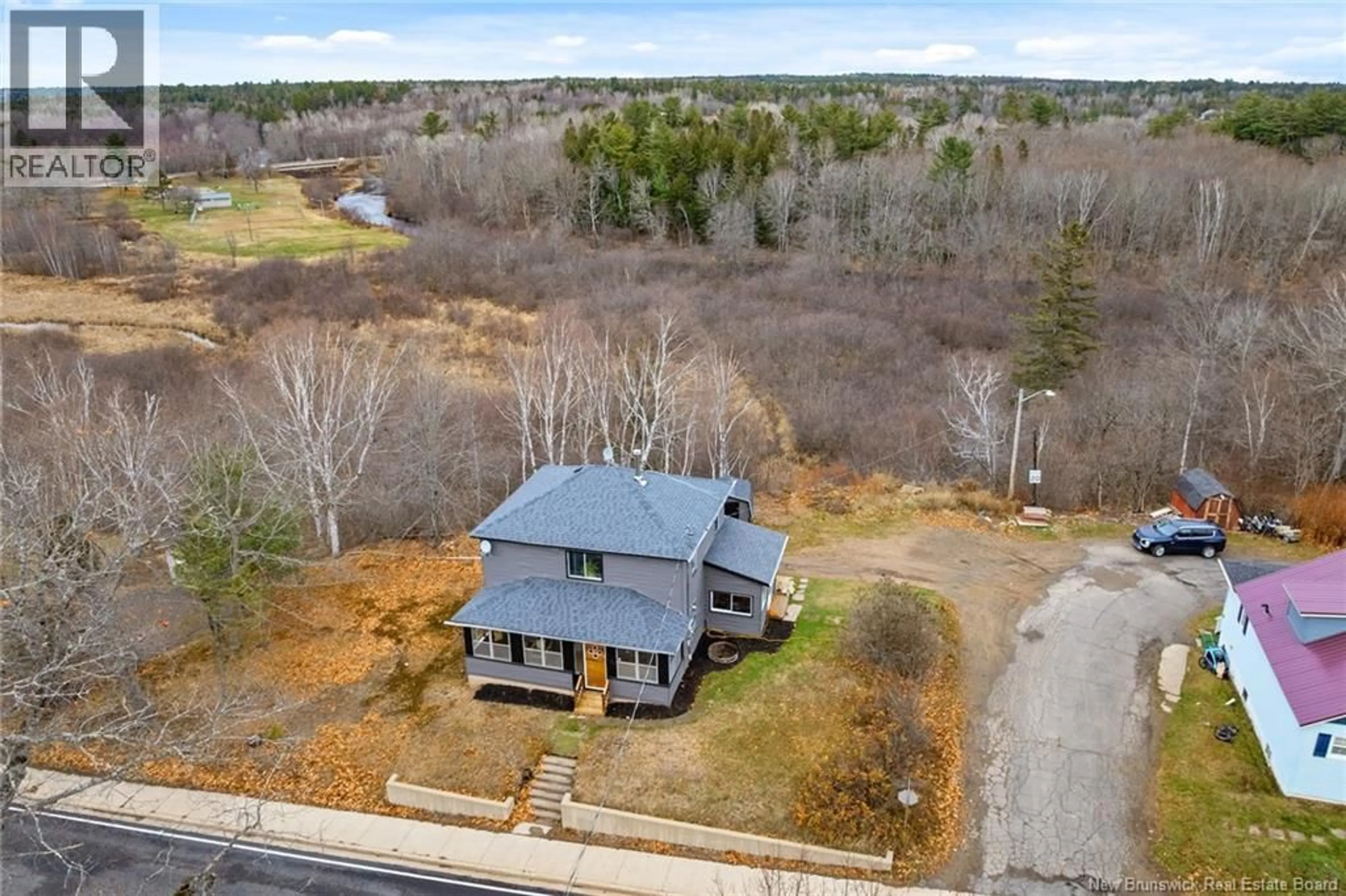 A pic from outside/outdoor area/front of a property/back of a property/a pic from drone, unknown for 5 BANK STREET, Minto New Brunswick E4B3K2