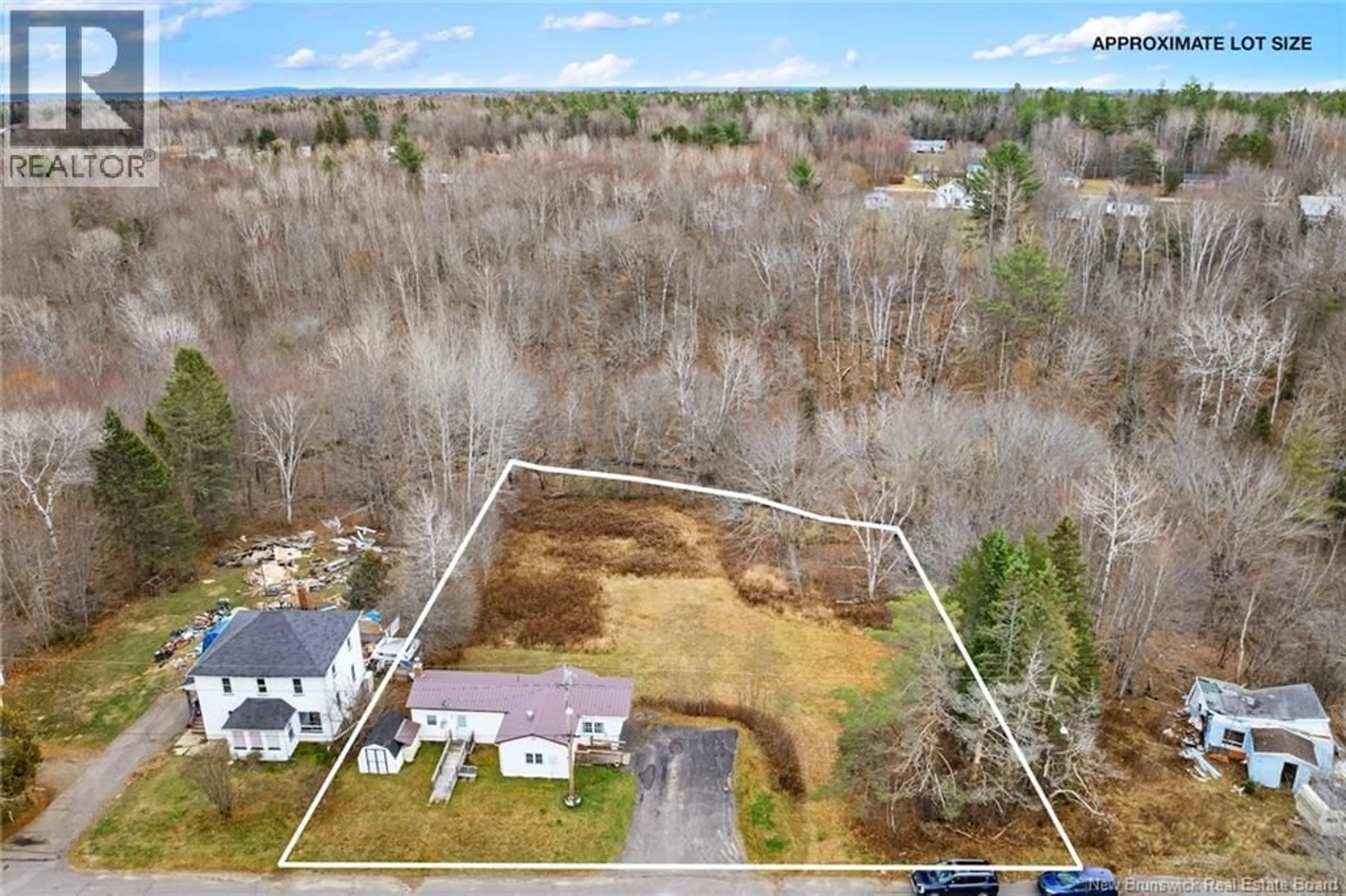 A pic from outside/outdoor area/front of a property/back of a property/a pic from drone, unknown for 71 CHESTNUT STREET, Minto New Brunswick E4B3L4