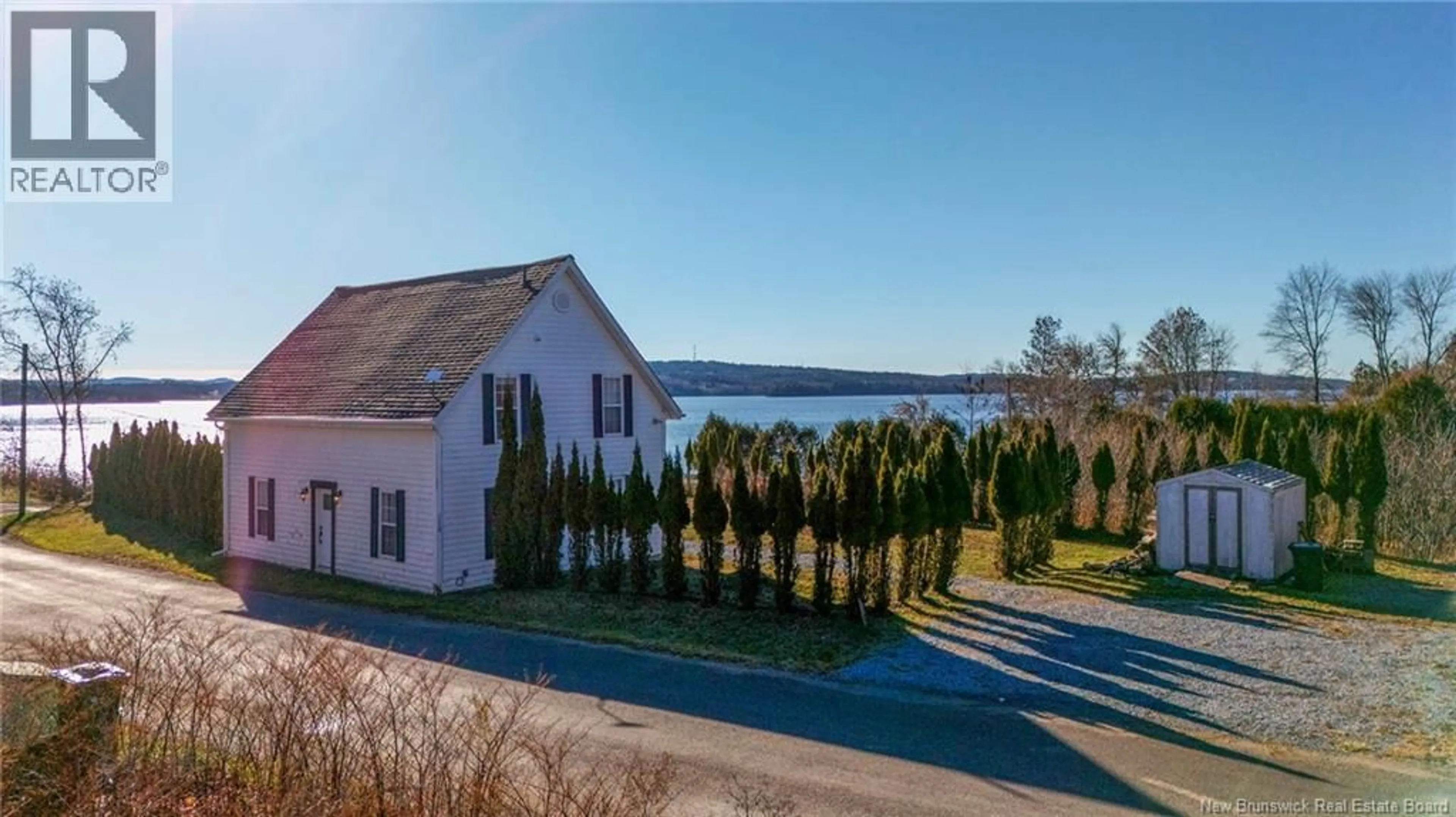 A pic from outside/outdoor area/front of a property/back of a property/a pic from drone, water/lake/river/ocean view for 118 PERRY POINT ROAD, Kingston New Brunswick E5N1J1
