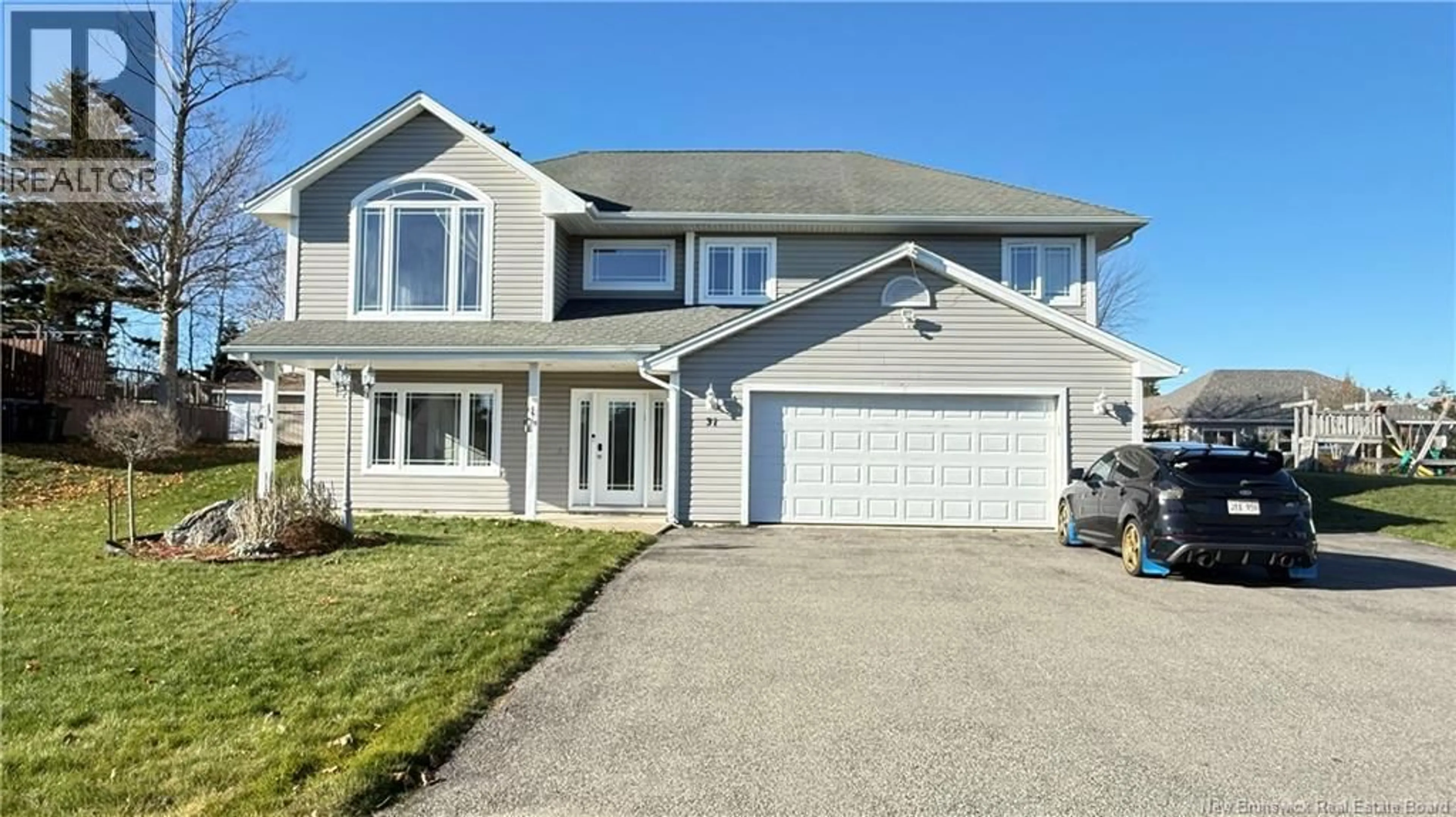 Home with vinyl exterior material, street for 31 REFLECTION LANE, Quispamsis New Brunswick E2E5Z9