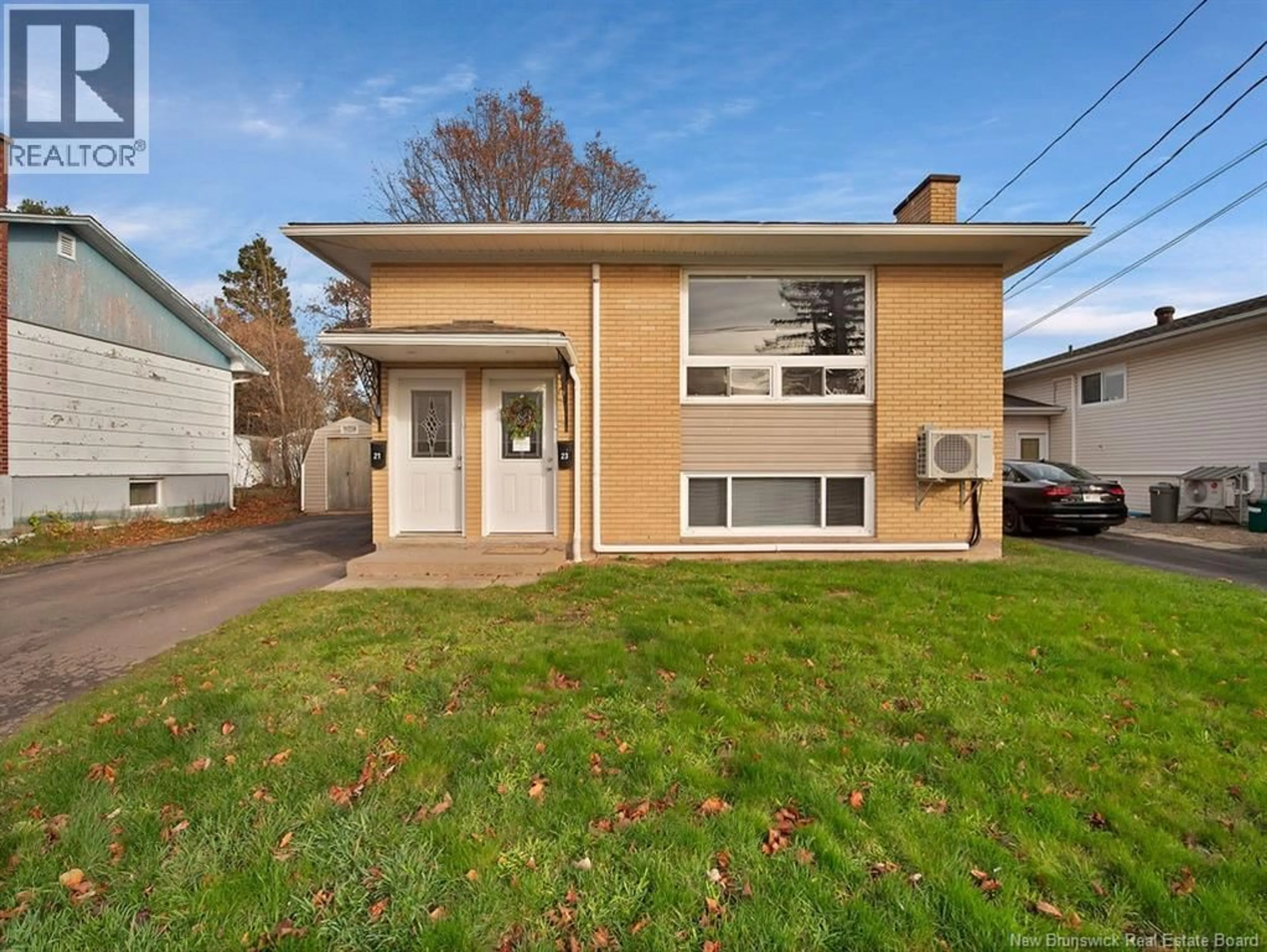 Home with vinyl exterior material, street for 21-23 EIGHTH STREET, Moncton New Brunswick E1E3E6