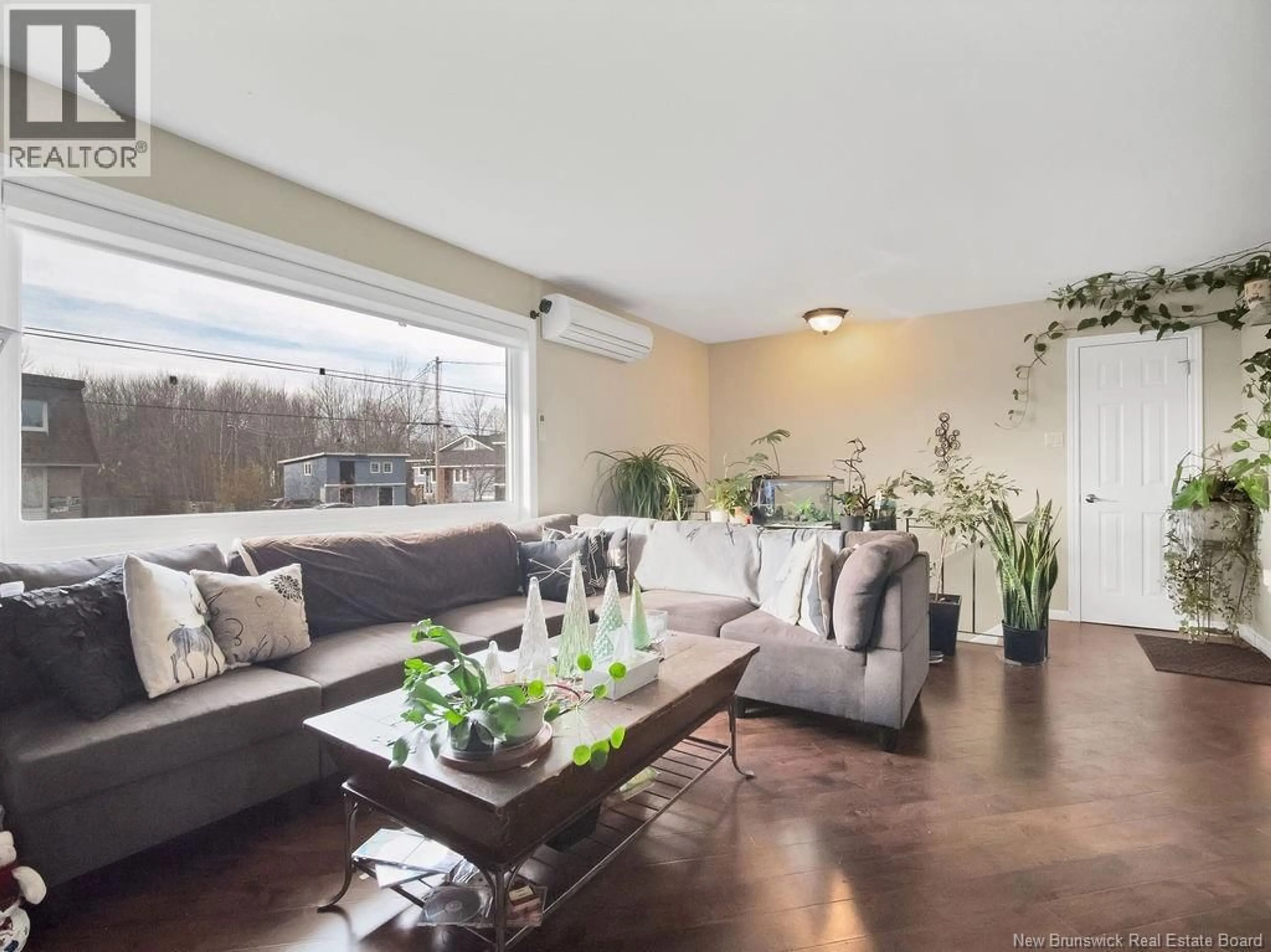 Living room with furniture, unknown for 21-23 EIGHTH STREET, Moncton New Brunswick E1E3E6