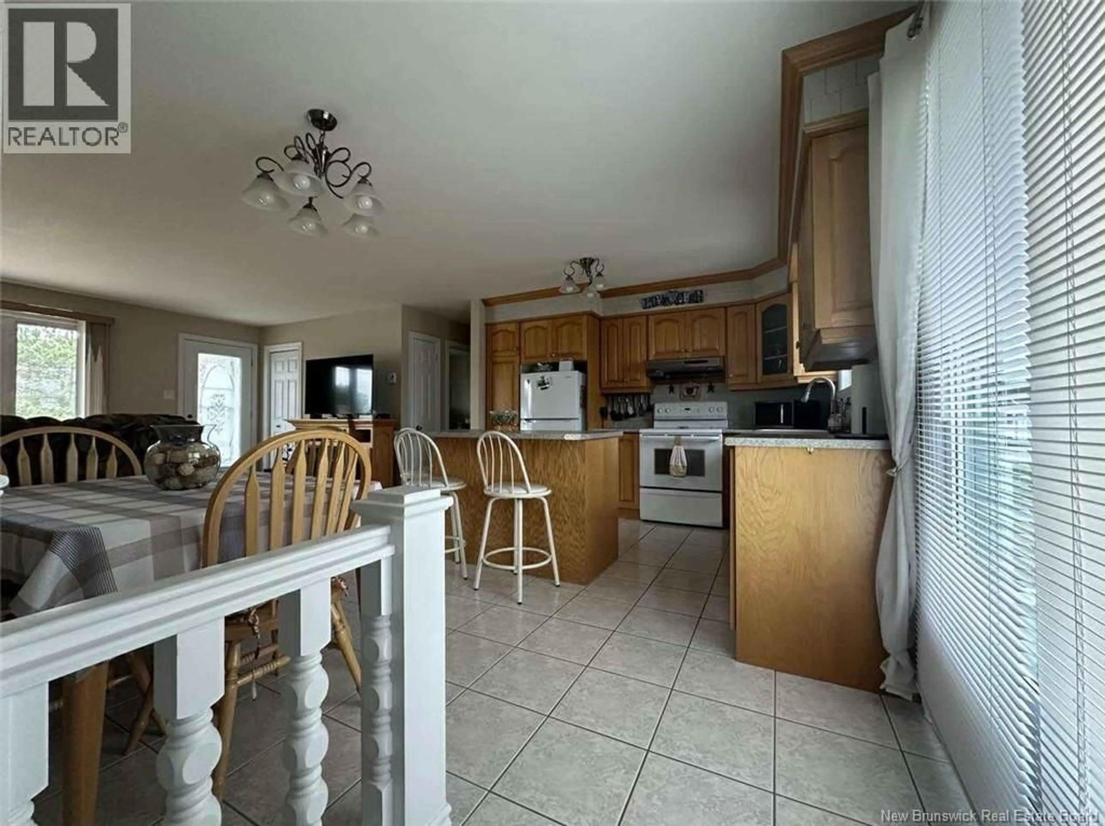 Open concept kitchen, ceramic/tile floor for 654 2IEME AVE, Grand-Sault/Grand Falls New Brunswick E3Z1A3
