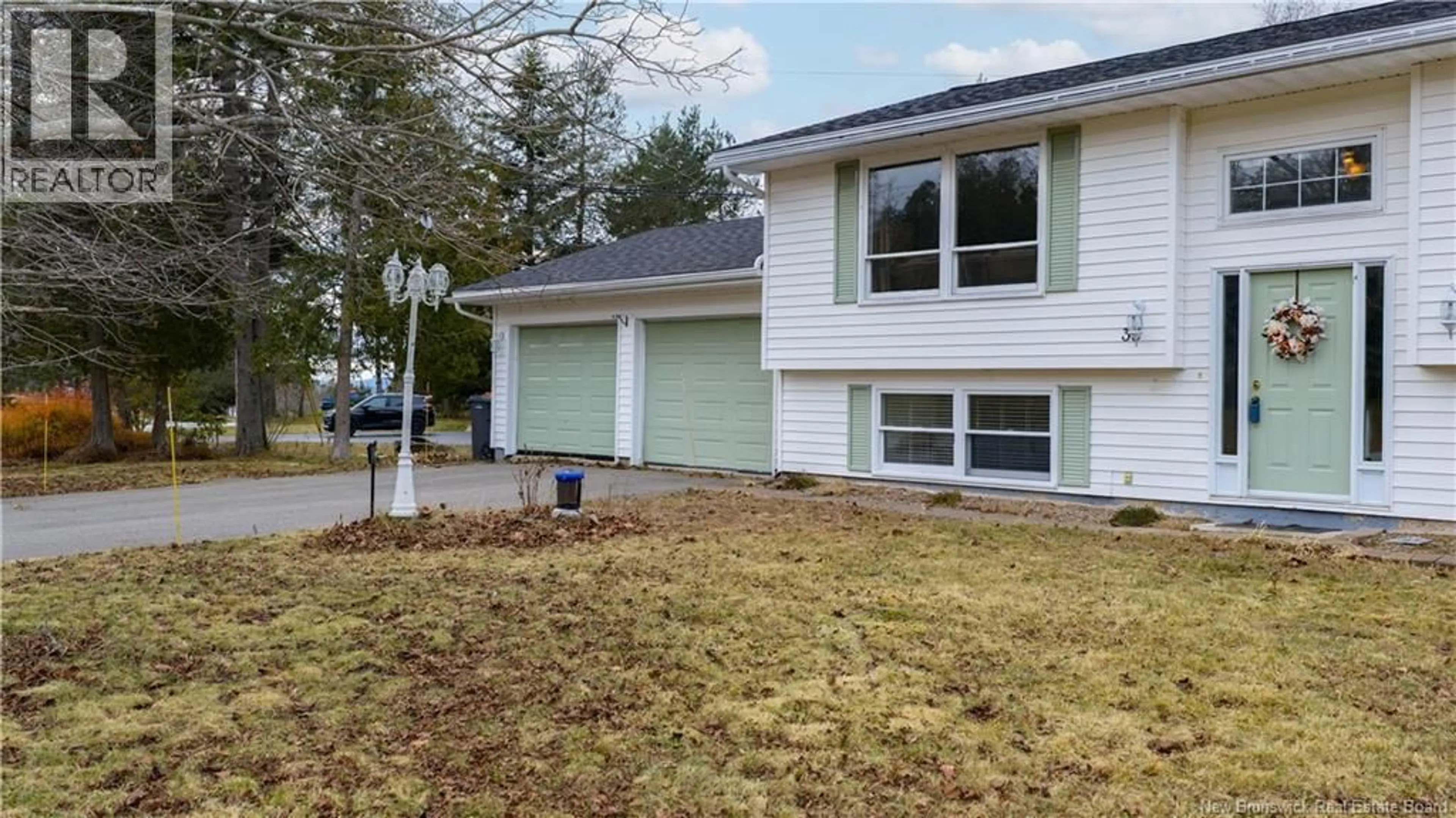 Home with vinyl exterior material, street for 35 PEAT DRIVE, Quispamsis New Brunswick E2E4R6