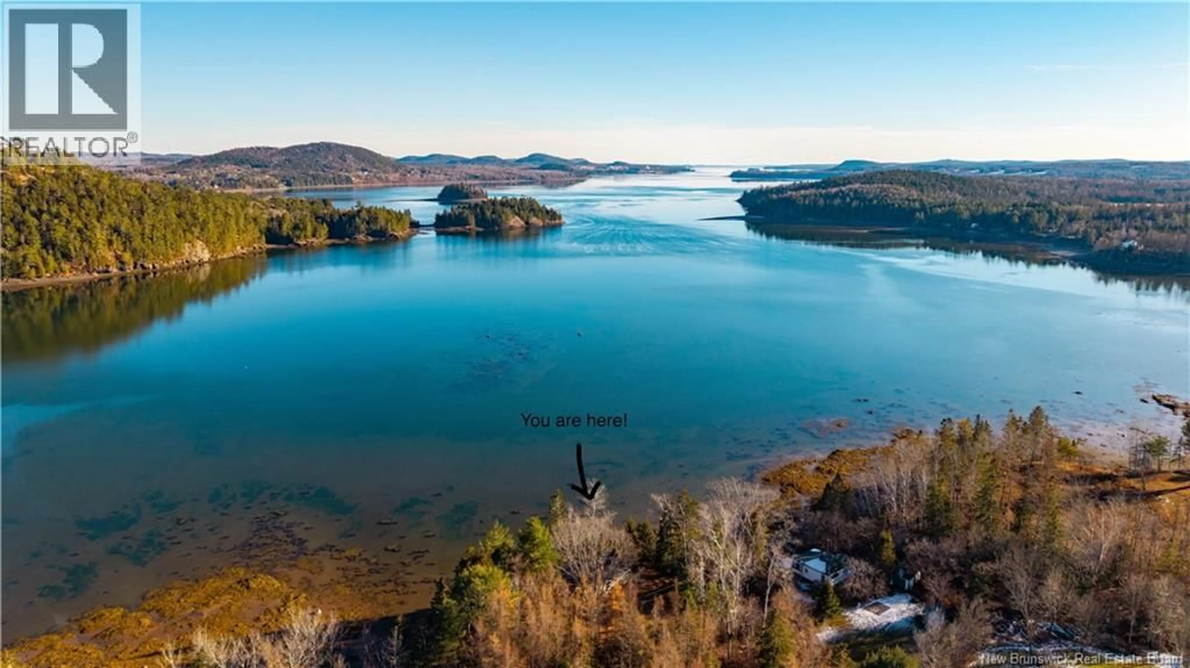 A pic from outside/outdoor area/front of a property/back of a property/a pic from drone, water/lake/river/ocean view for 11 COFFEY LANE, Oak Bay New Brunswick E3L3W2