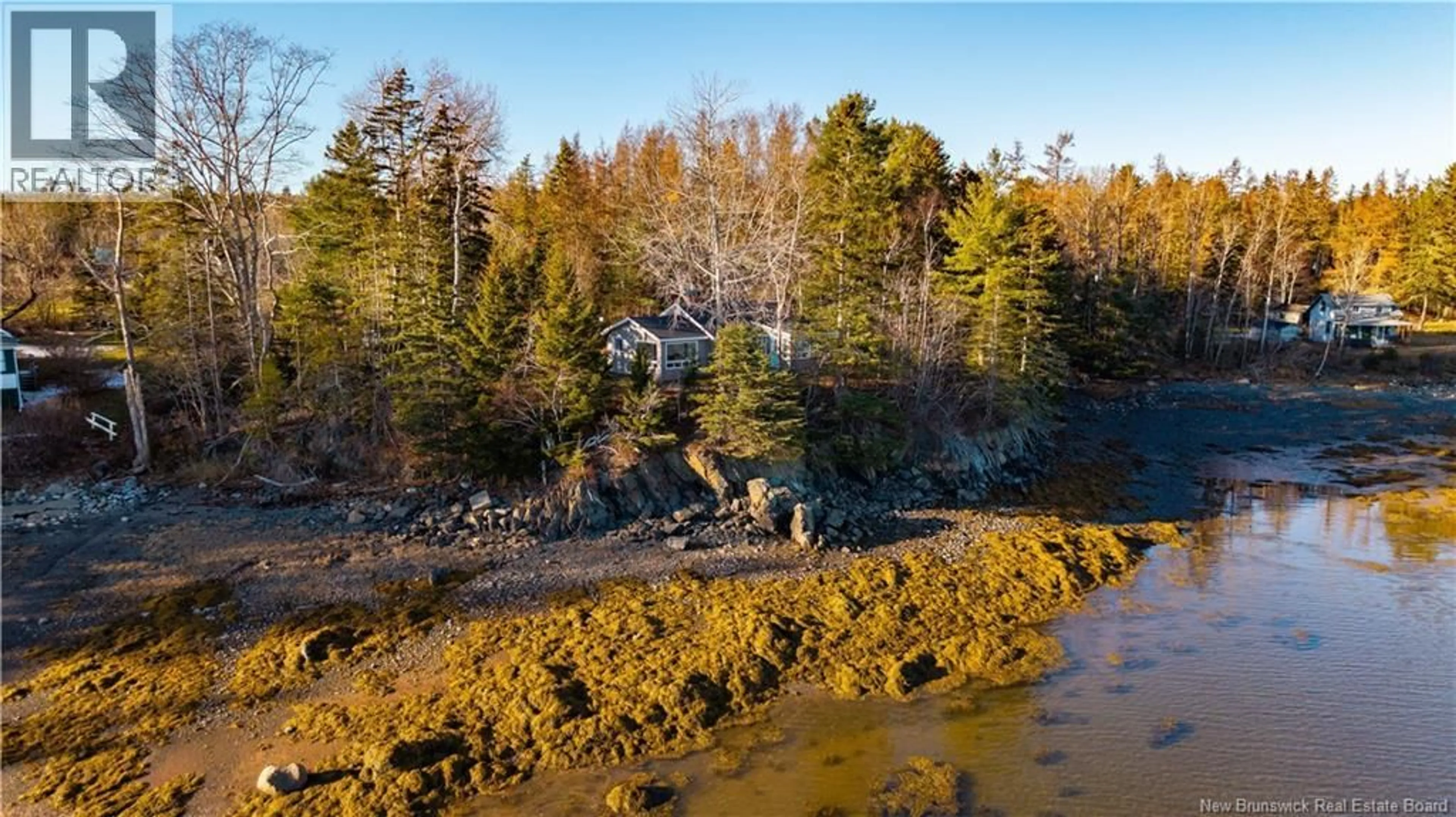 A pic from outside/outdoor area/front of a property/back of a property/a pic from drone, water/lake/river/ocean view for 11 COFFEY LANE, Oak Bay New Brunswick E3L3W2