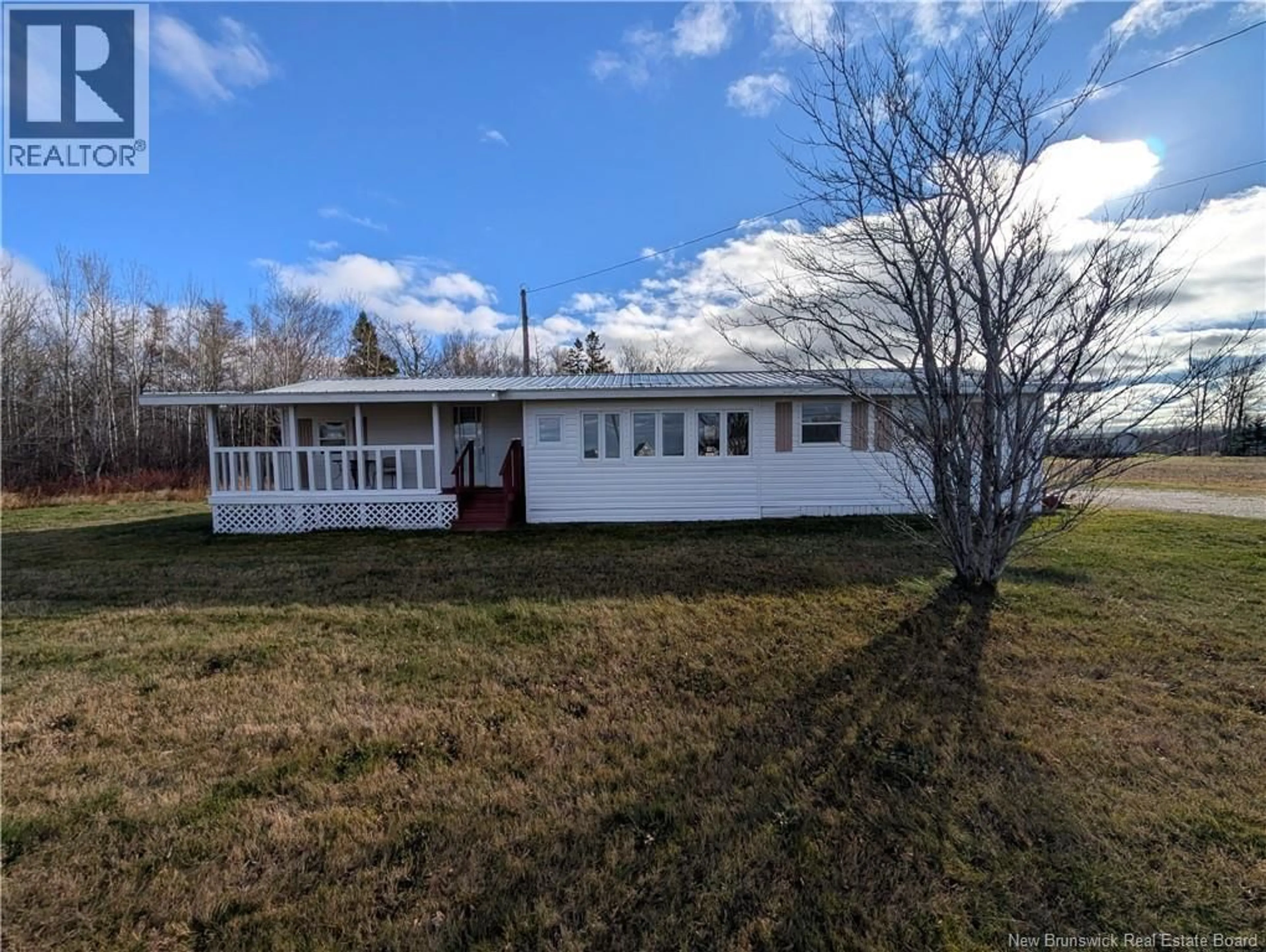 A pic from outside/outdoor area/front of a property/back of a property/a pic from drone, unknown for 5696 ROUTE 11, Janeville New Brunswick E2A5K2