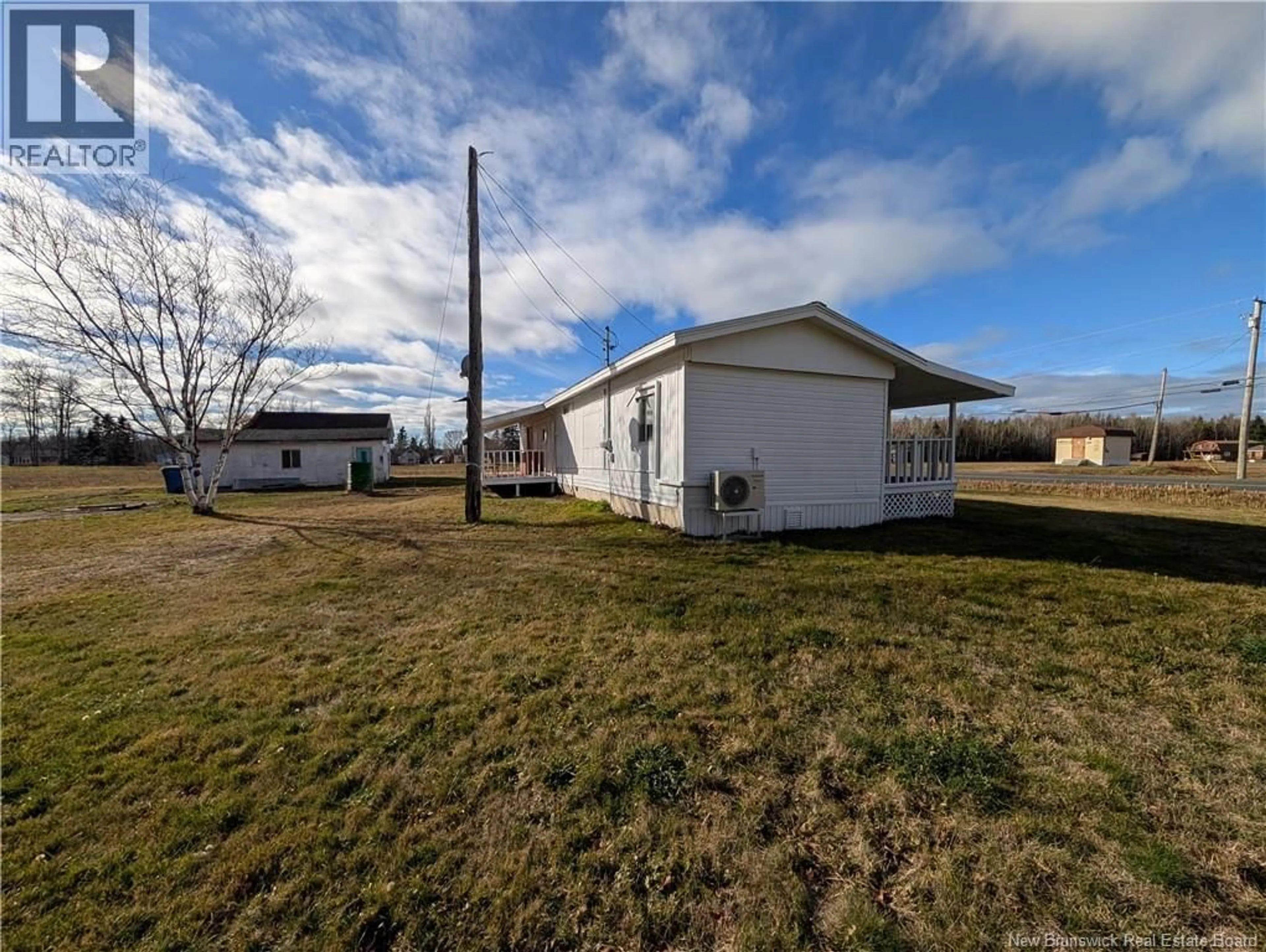 A pic from outside/outdoor area/front of a property/back of a property/a pic from drone, unknown for 5696 ROUTE 11, Janeville New Brunswick E2A5K2