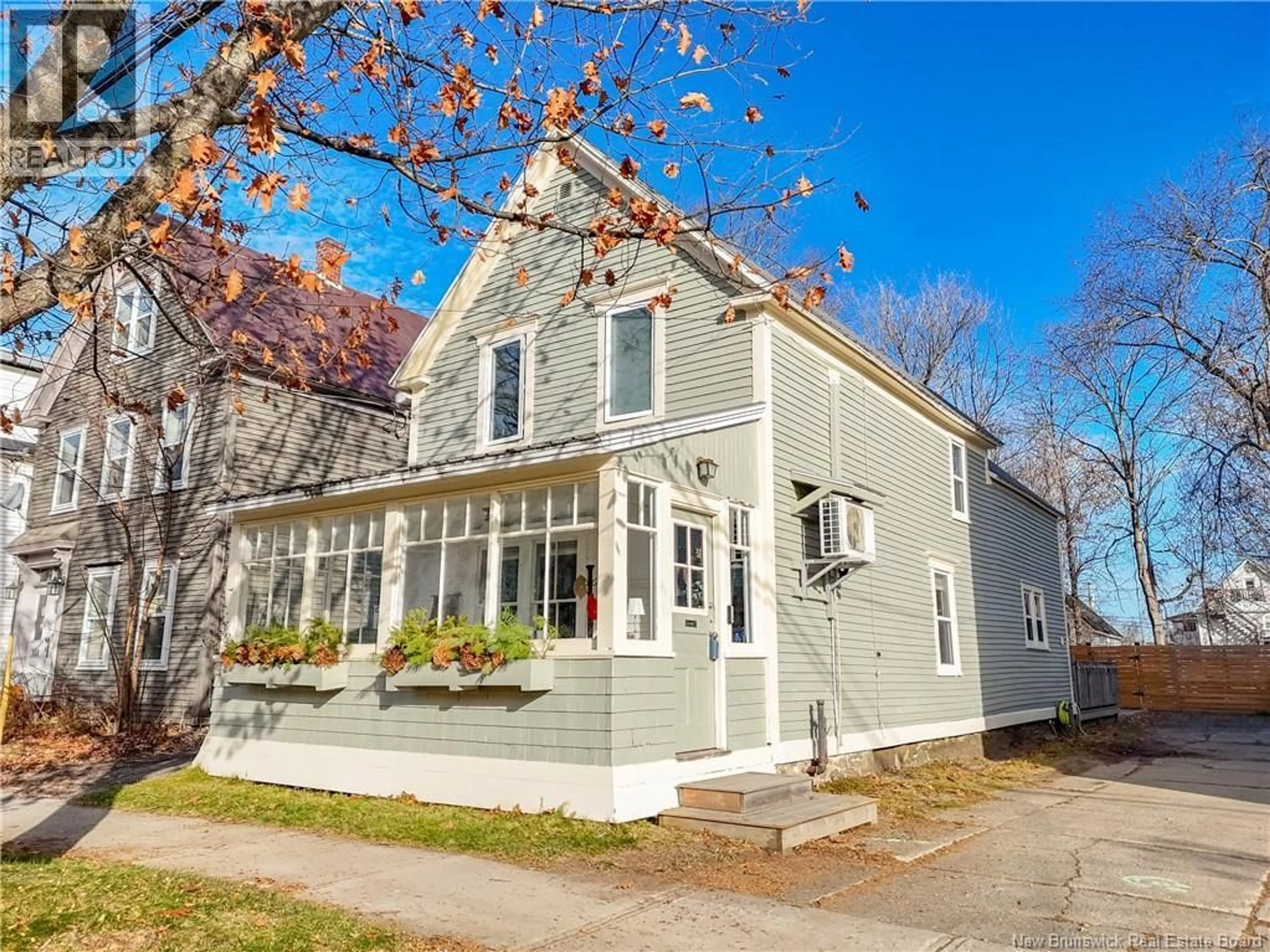 Home with vinyl exterior material, street for 363 CHARLOTTE STREET, Fredericton New Brunswick E3B1L6