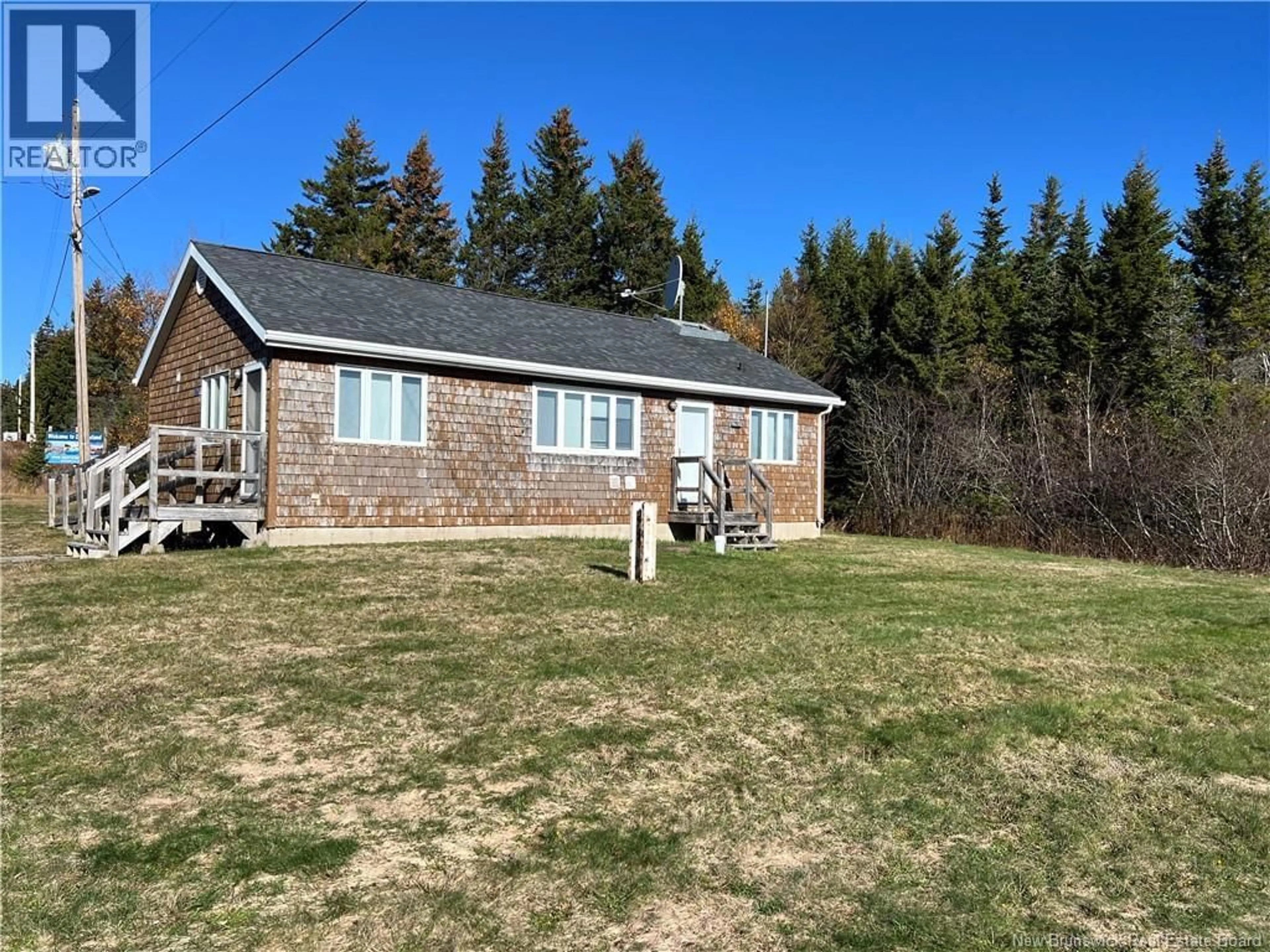A pic from outside/outdoor area/front of a property/back of a property/a pic from drone, unknown for 175 DEER ISLAND POINT ROAD, Cummings Cove New Brunswick E5V1V3