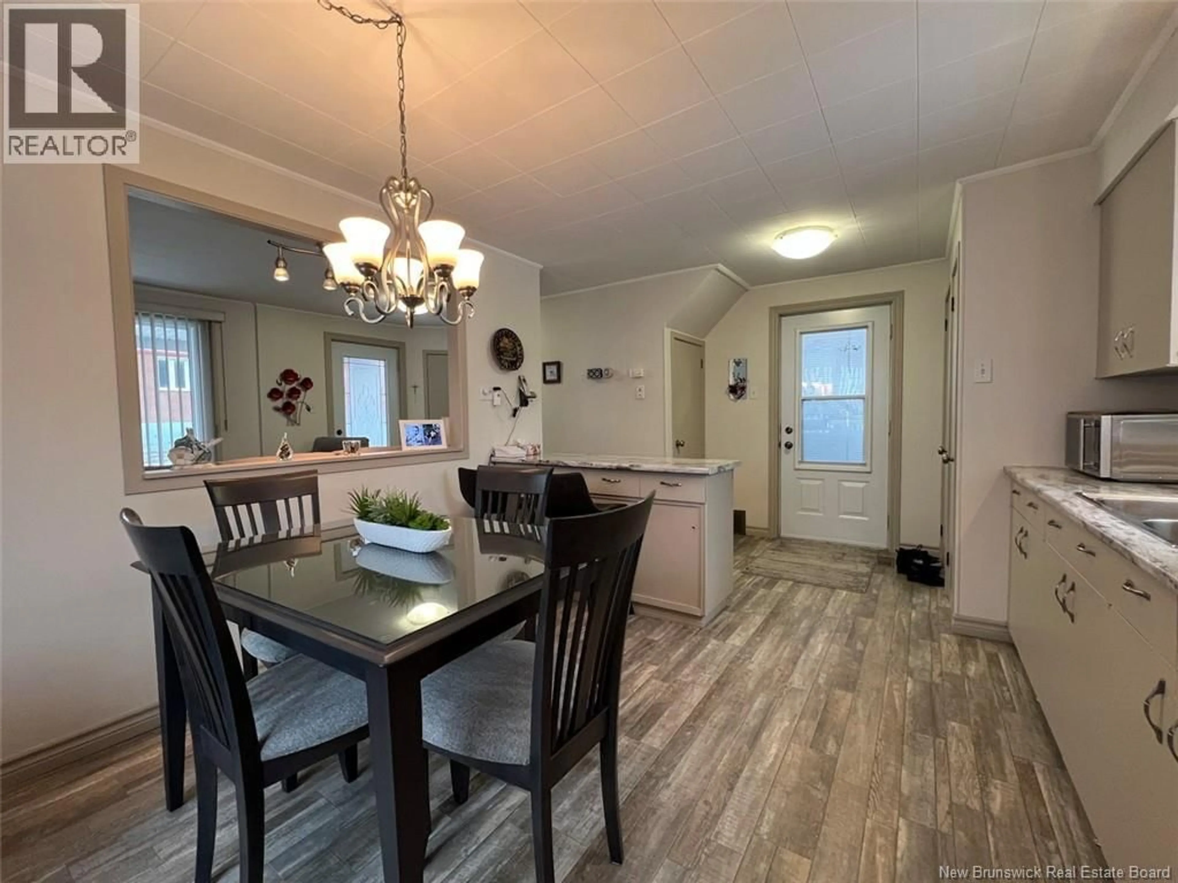 Dining room, wood/laminate floor for 54 MARTIN STREET, Edmundston New Brunswick E3V4E2