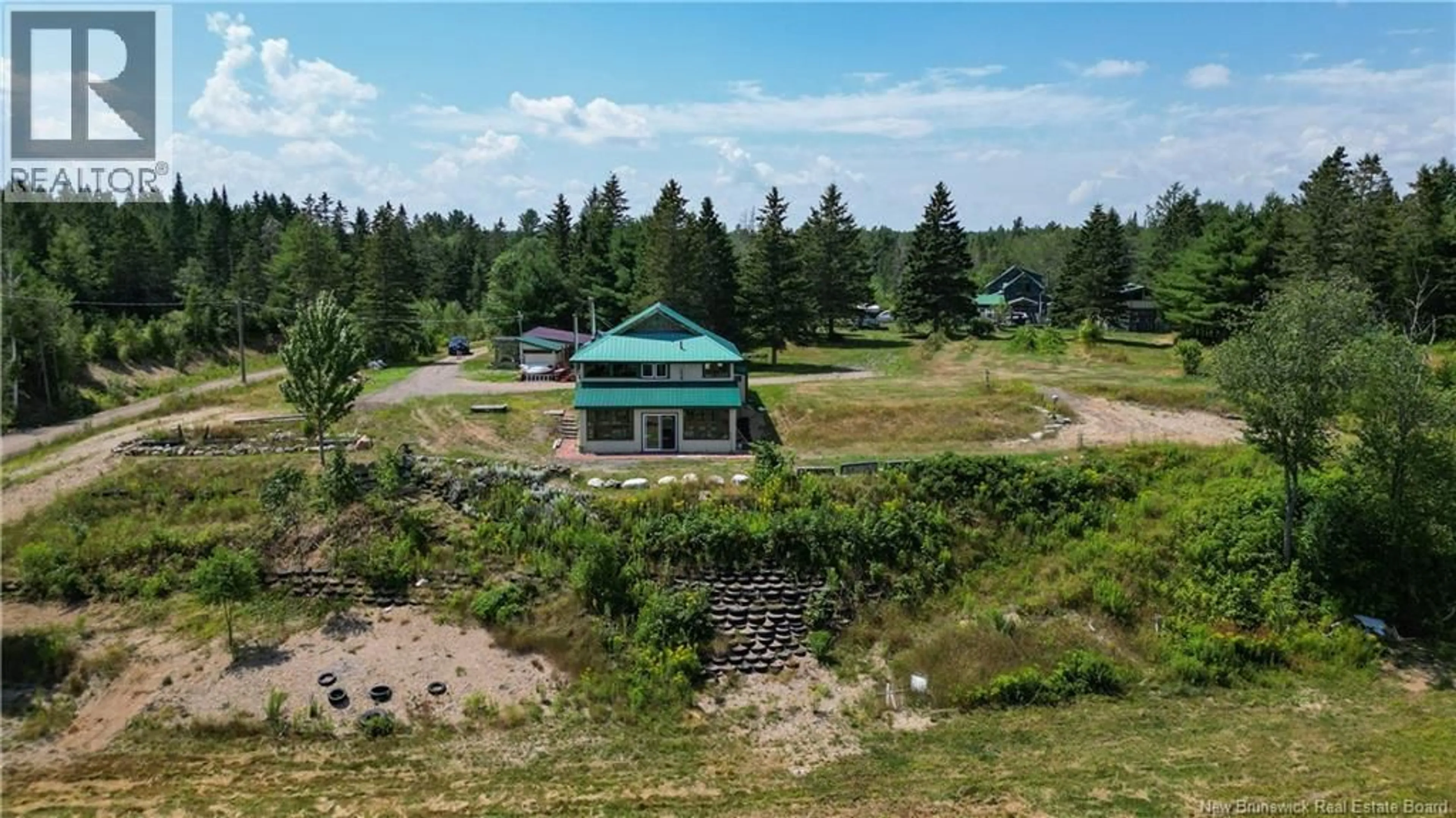 A pic from outside/outdoor area/front of a property/back of a property/a pic from drone, mountain view for 4199 ROUTE 3, Brockway New Brunswick E6K1Y3