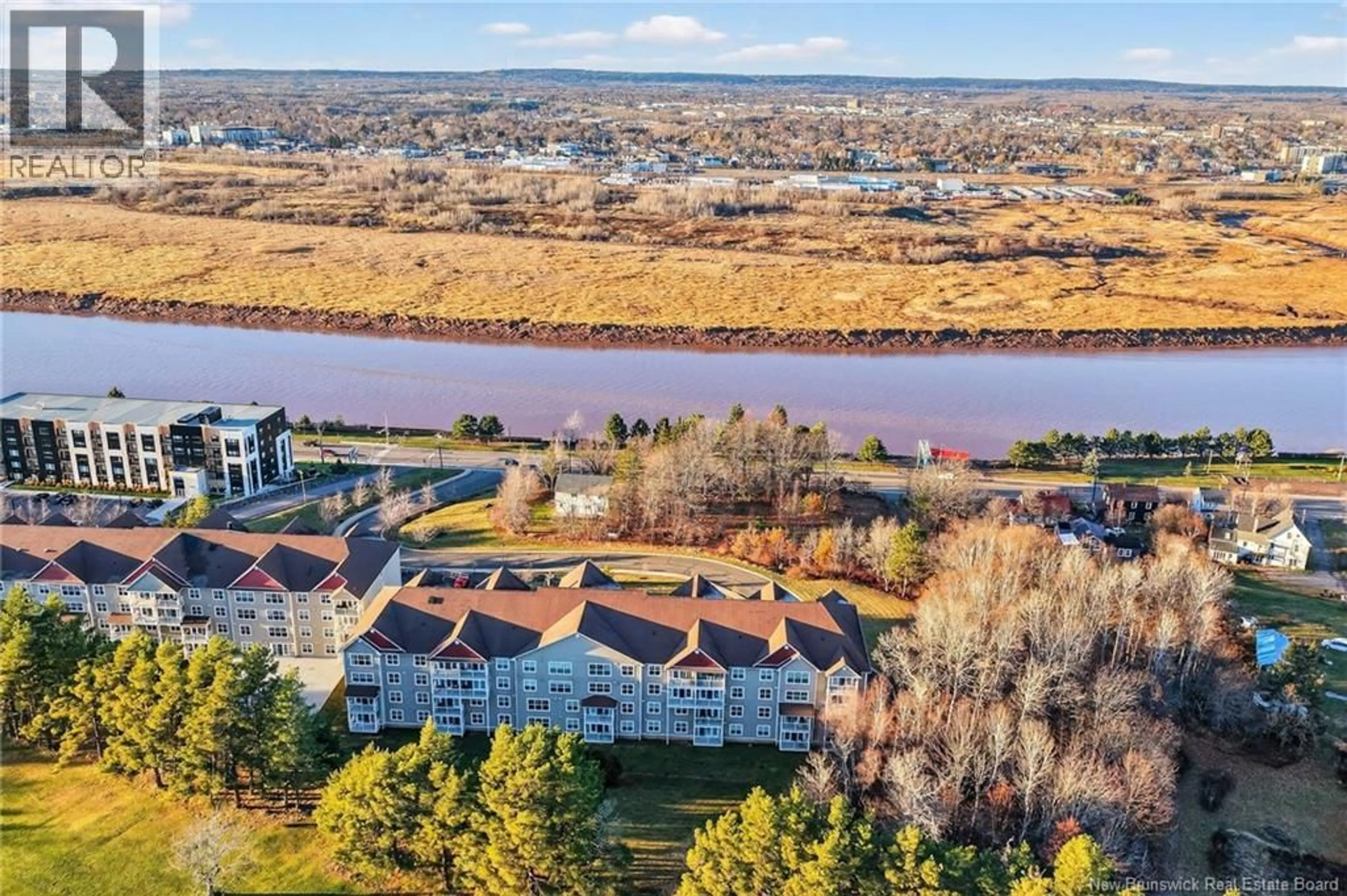 A pic from outside/outdoor area/front of a property/back of a property/a pic from drone, water/lake/river/ocean view for 301 - 204 COVERDALE ROAD, Riverview New Brunswick E1B0J2