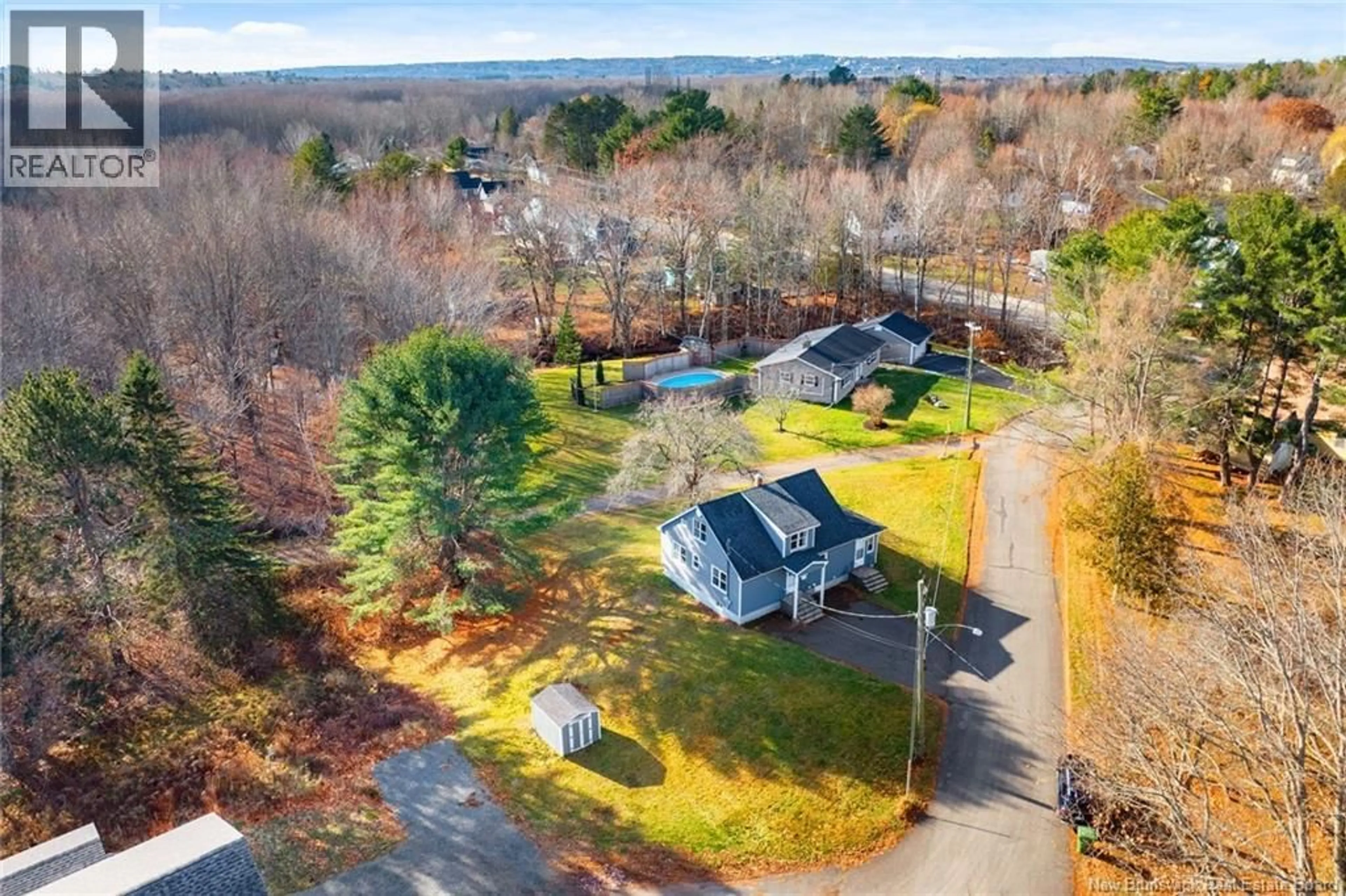 A pic from outside/outdoor area/front of a property/back of a property/a pic from drone, unknown for 8 DODONA PLACE, Fredericton New Brunswick E3A4B7