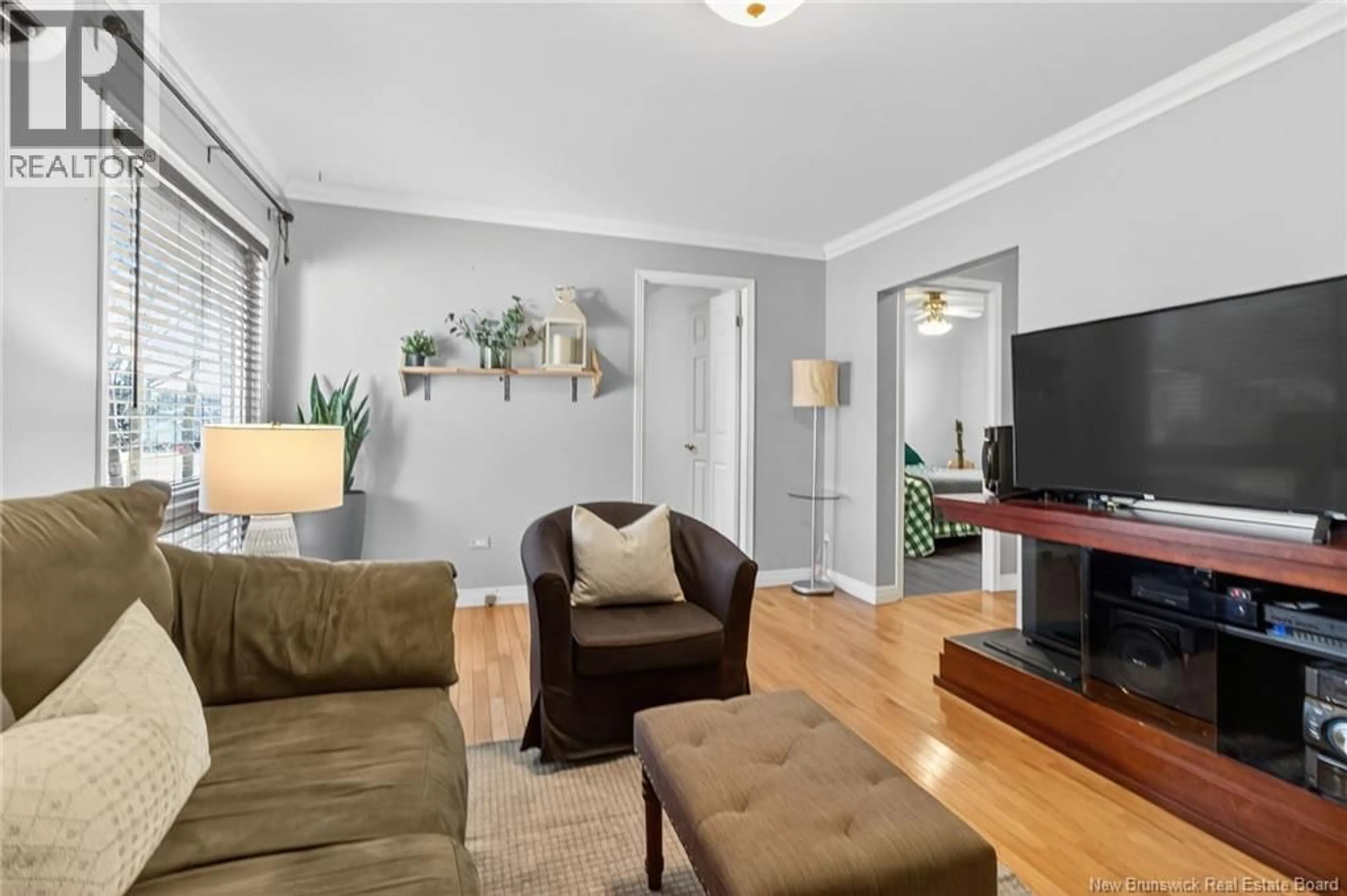 Living room with furniture, unknown for 76 LESLIE STREET, Moncton New Brunswick E1C6M5