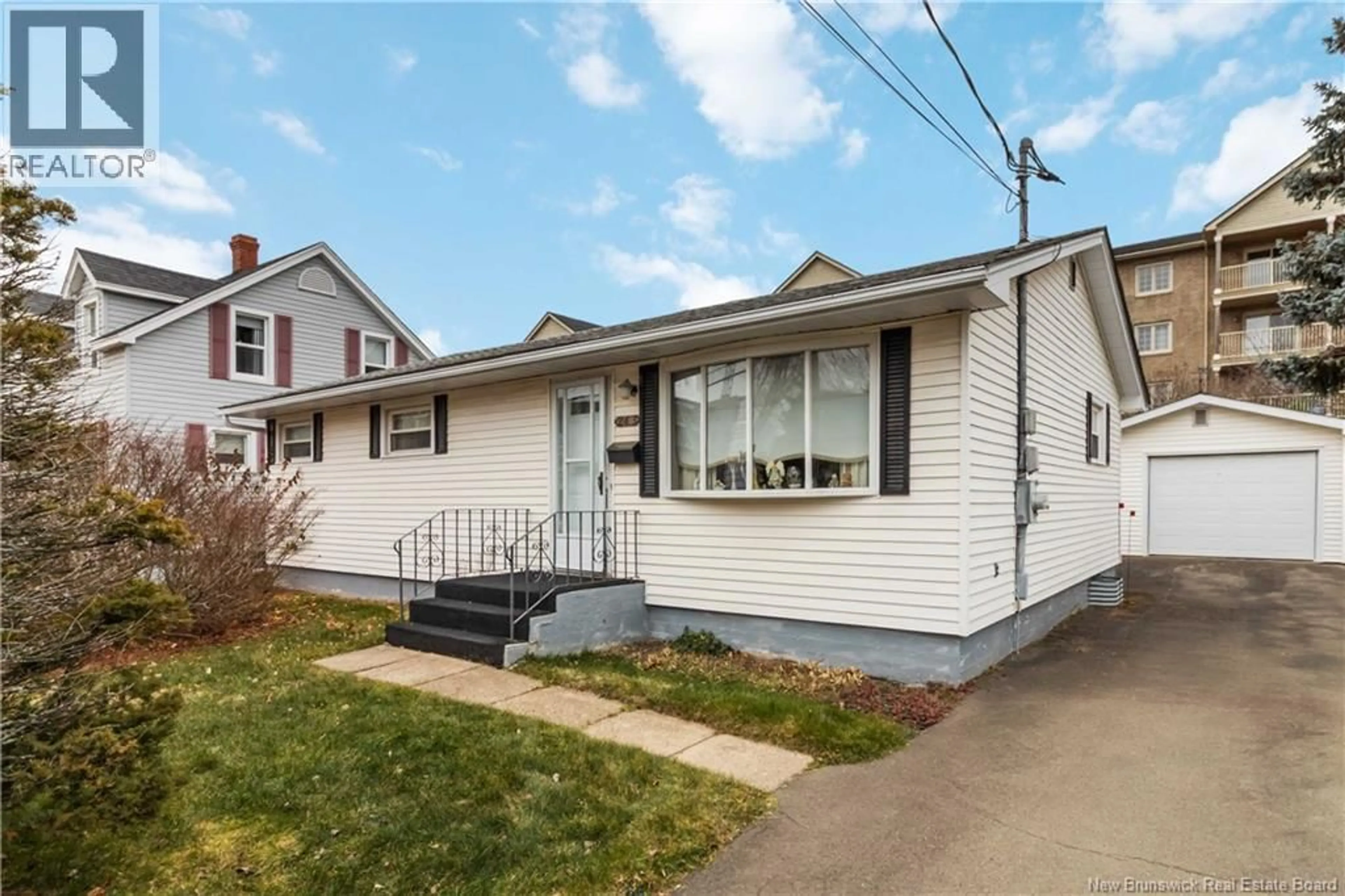 Home with vinyl exterior material, street for 263 NORMANDIE STREET, Dieppe New Brunswick E1A1L6