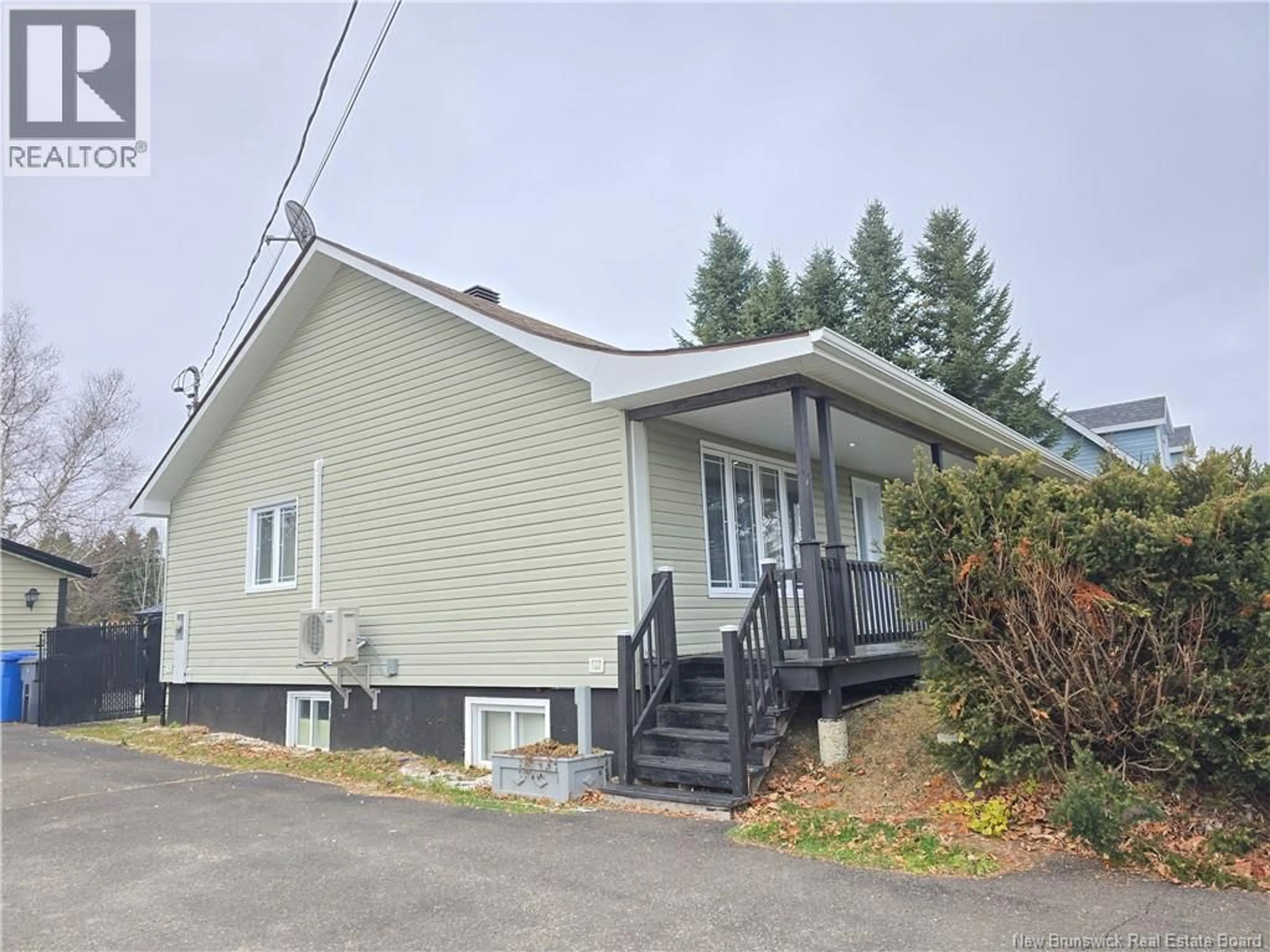 Home with vinyl exterior material, street for 27 HIGHLAND, Tide Head New Brunswick E3N4L6