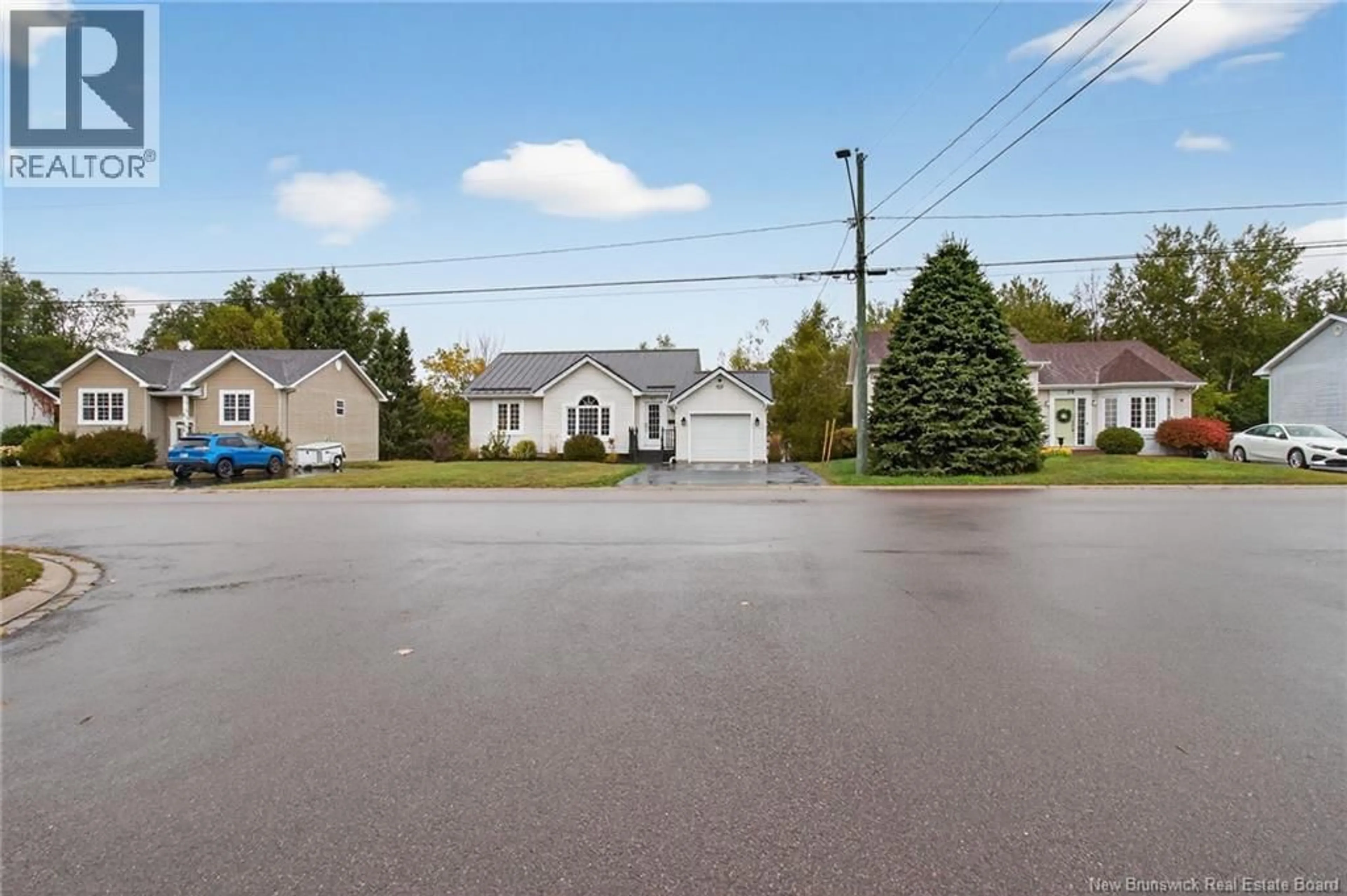 A pic from outside/outdoor area/front of a property/back of a property/a pic from drone, street for 52 FREDERIC, Dieppe New Brunswick E1A7H9